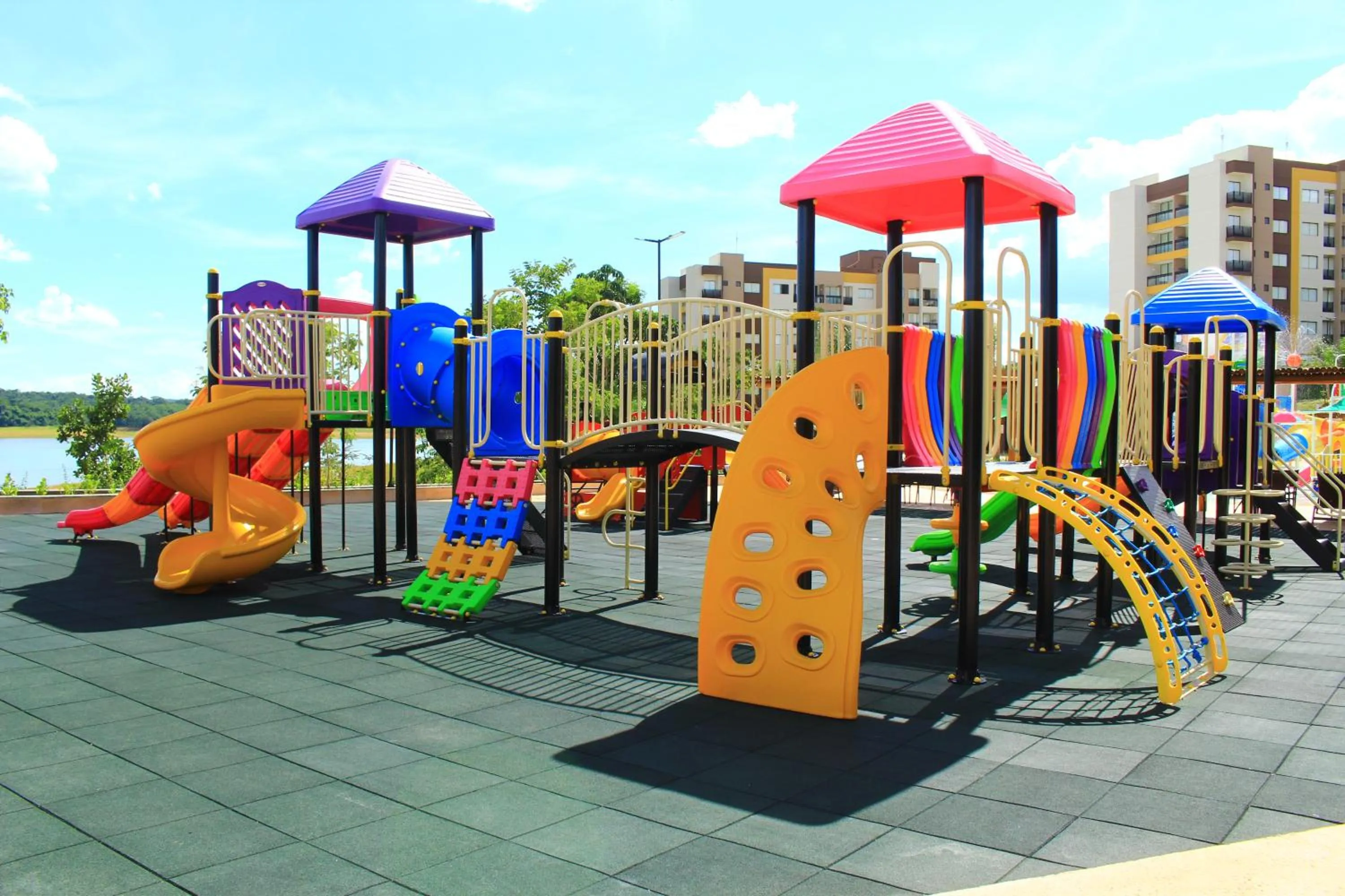 Children play ground in Praias do Lago Eco Resort by WAM Experience