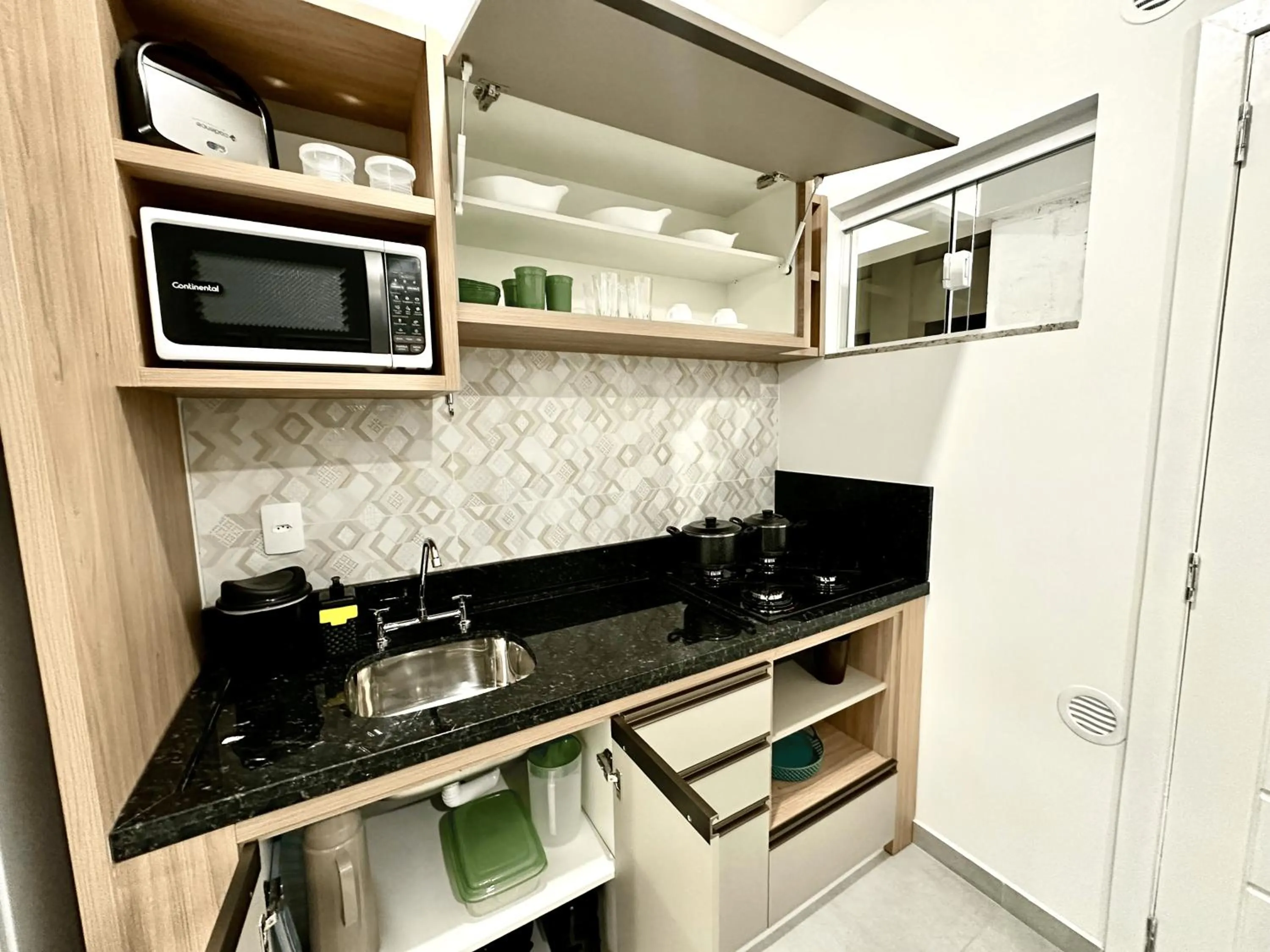 Kitchen or kitchenette in Ecomarine Apart-hotel 800 m Beto Carrero