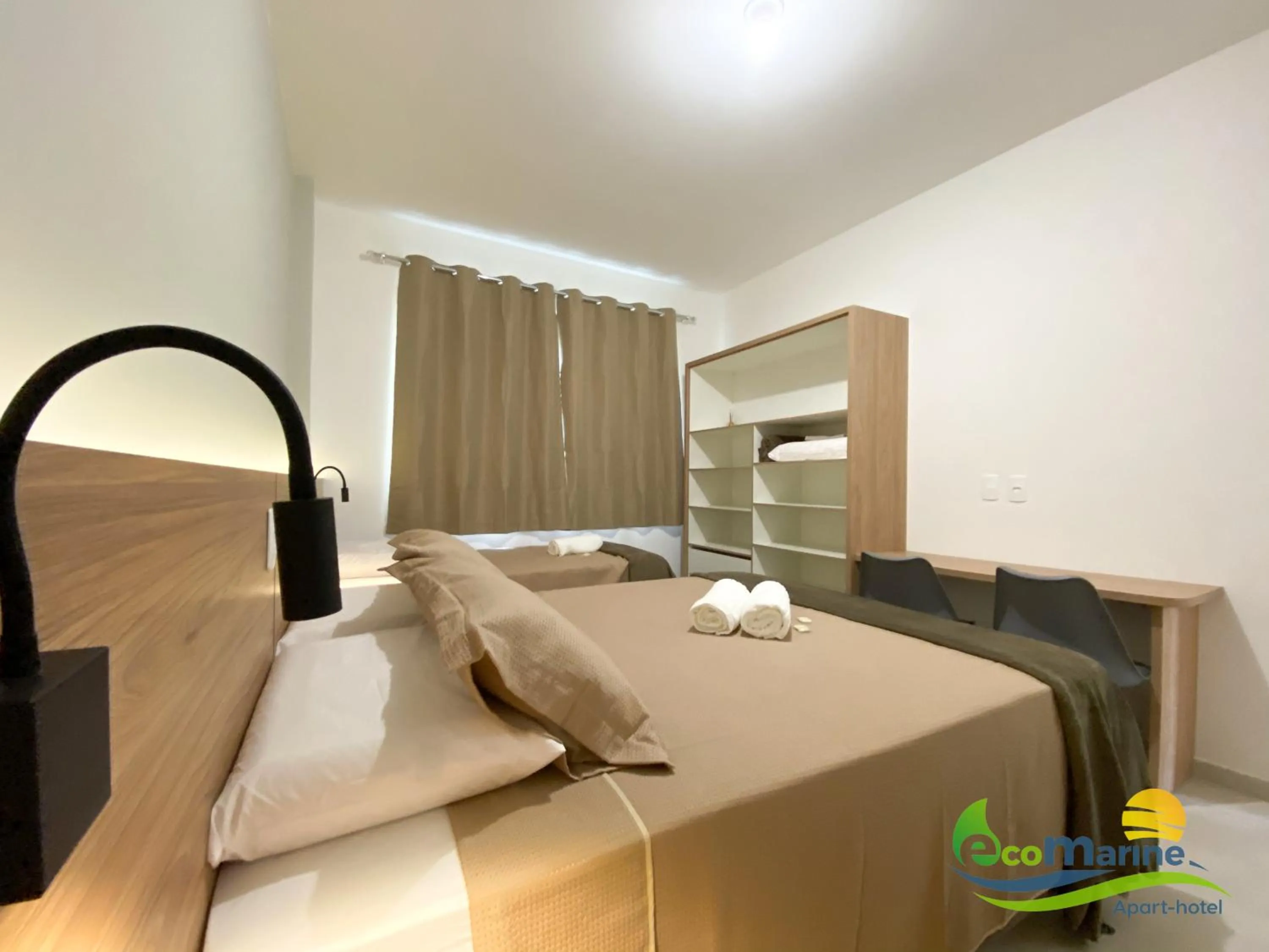 Photo of the whole room, Bed in Ecomarine Apart-hotel 800 m Beto Carrero