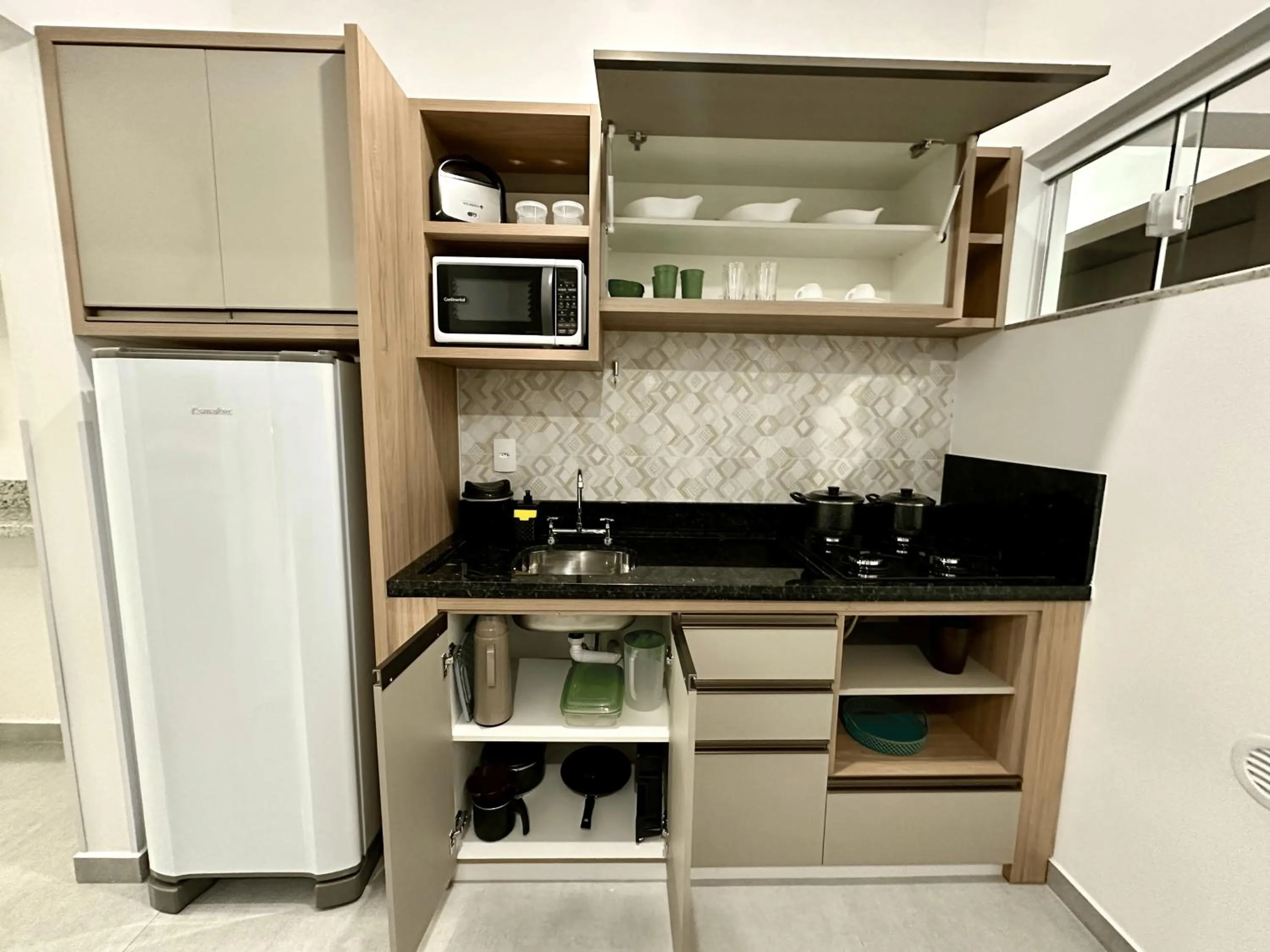 Kitchen or kitchenette in Ecomarine Apart-hotel 800 m Beto Carrero