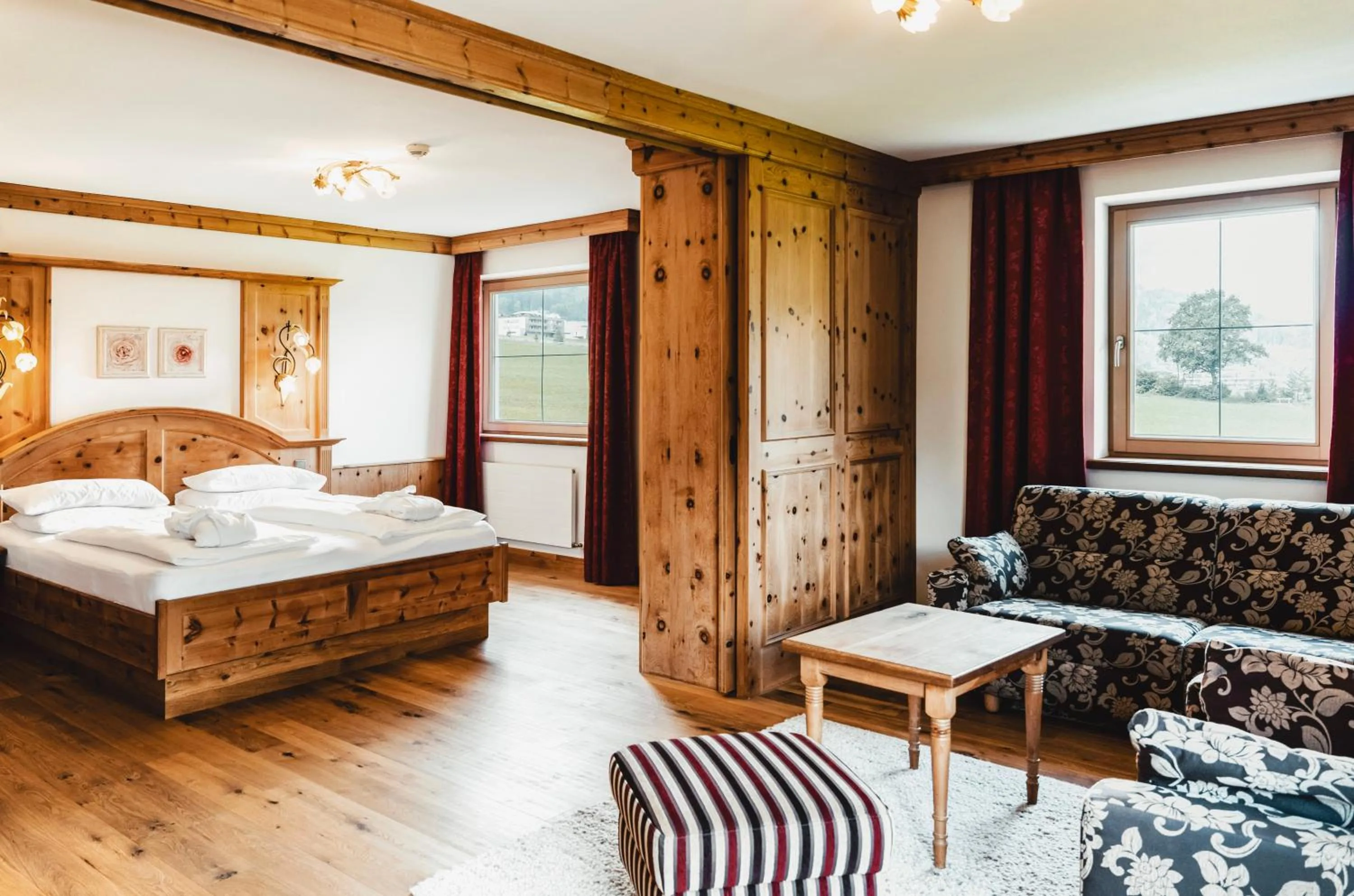 Photo of the whole room, Bed in HELD - Hotel & Spa , 4 Sterne Superior, Zillertal