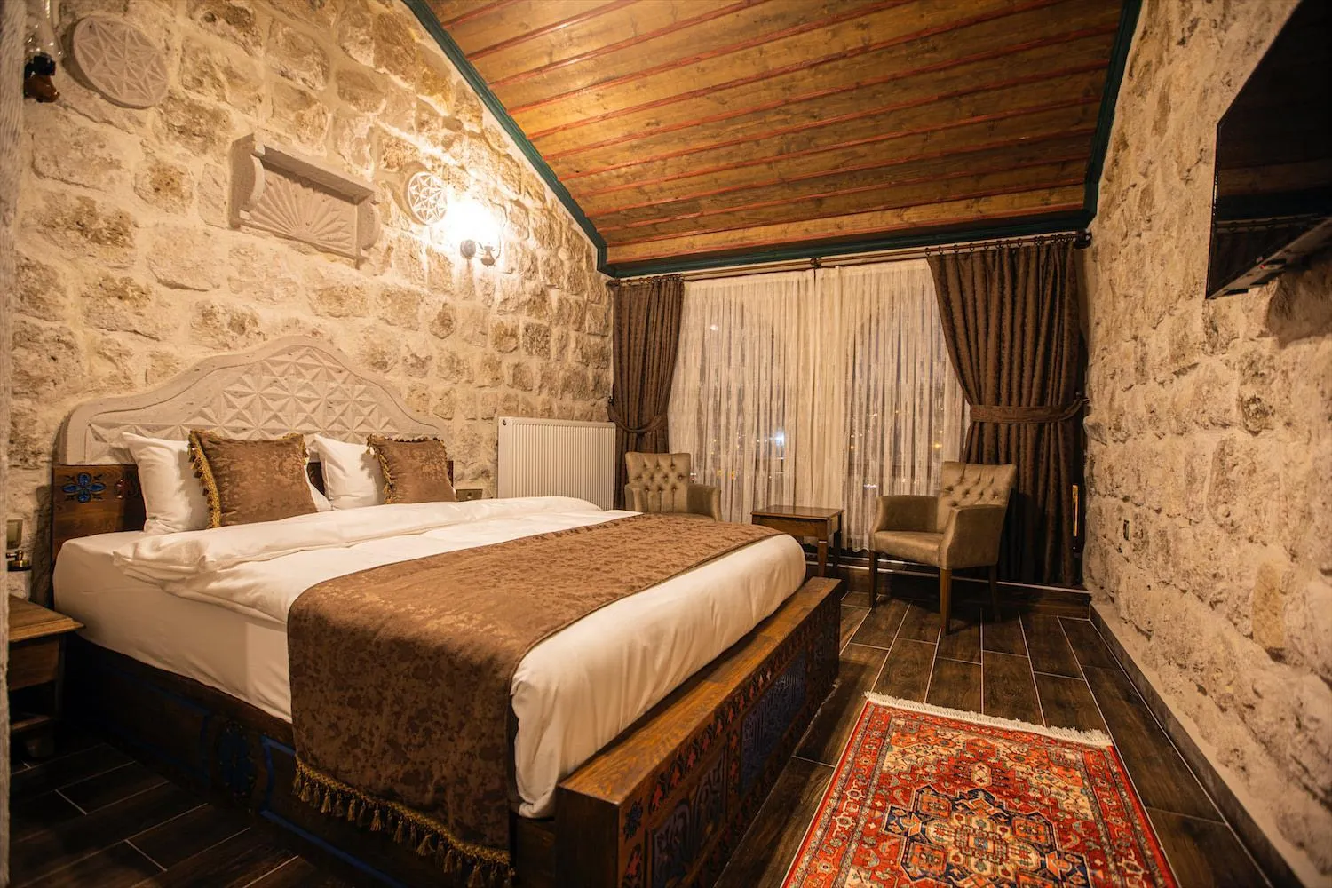Bed in Ada Cave Suites