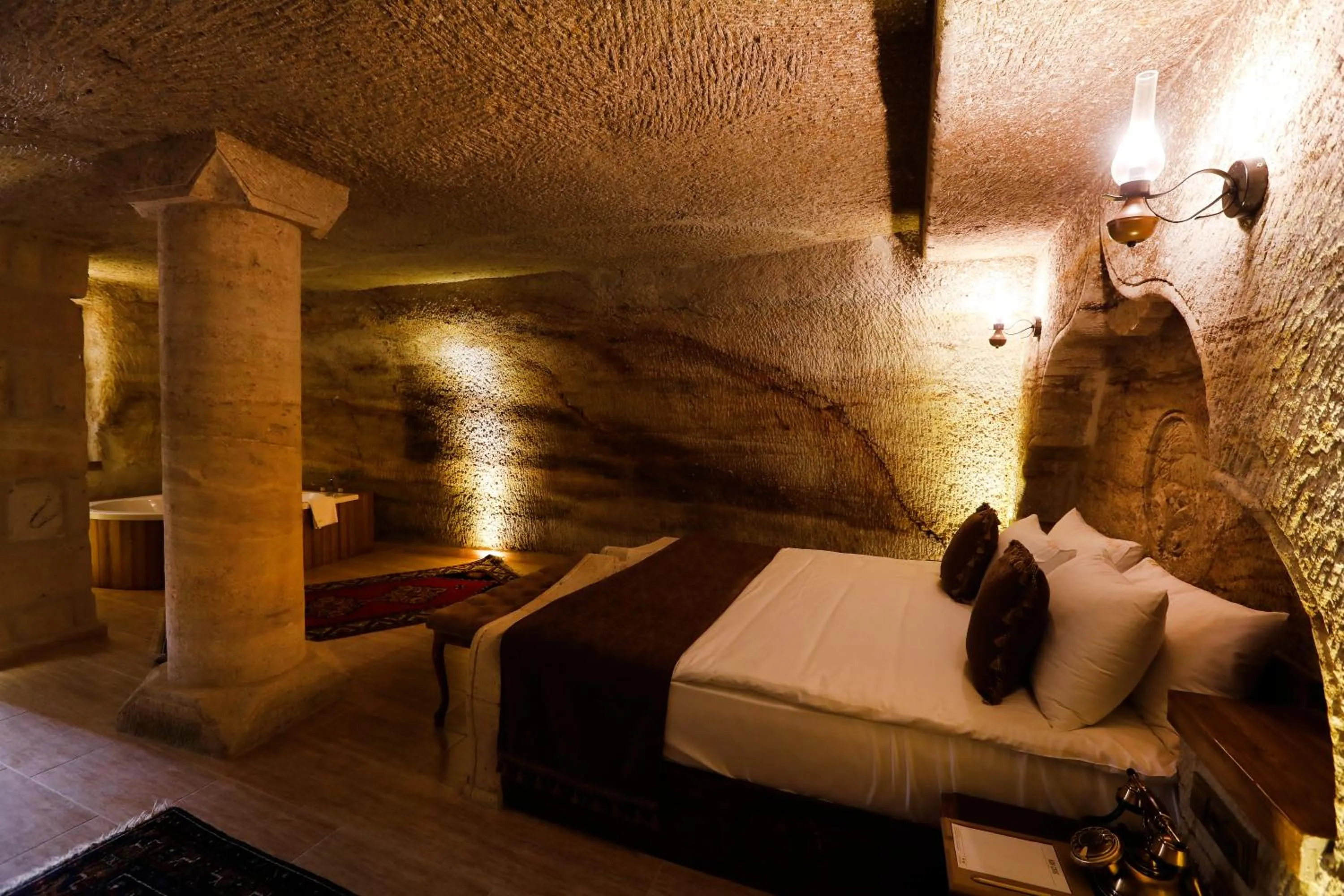 Bed in Ada Cave Suites