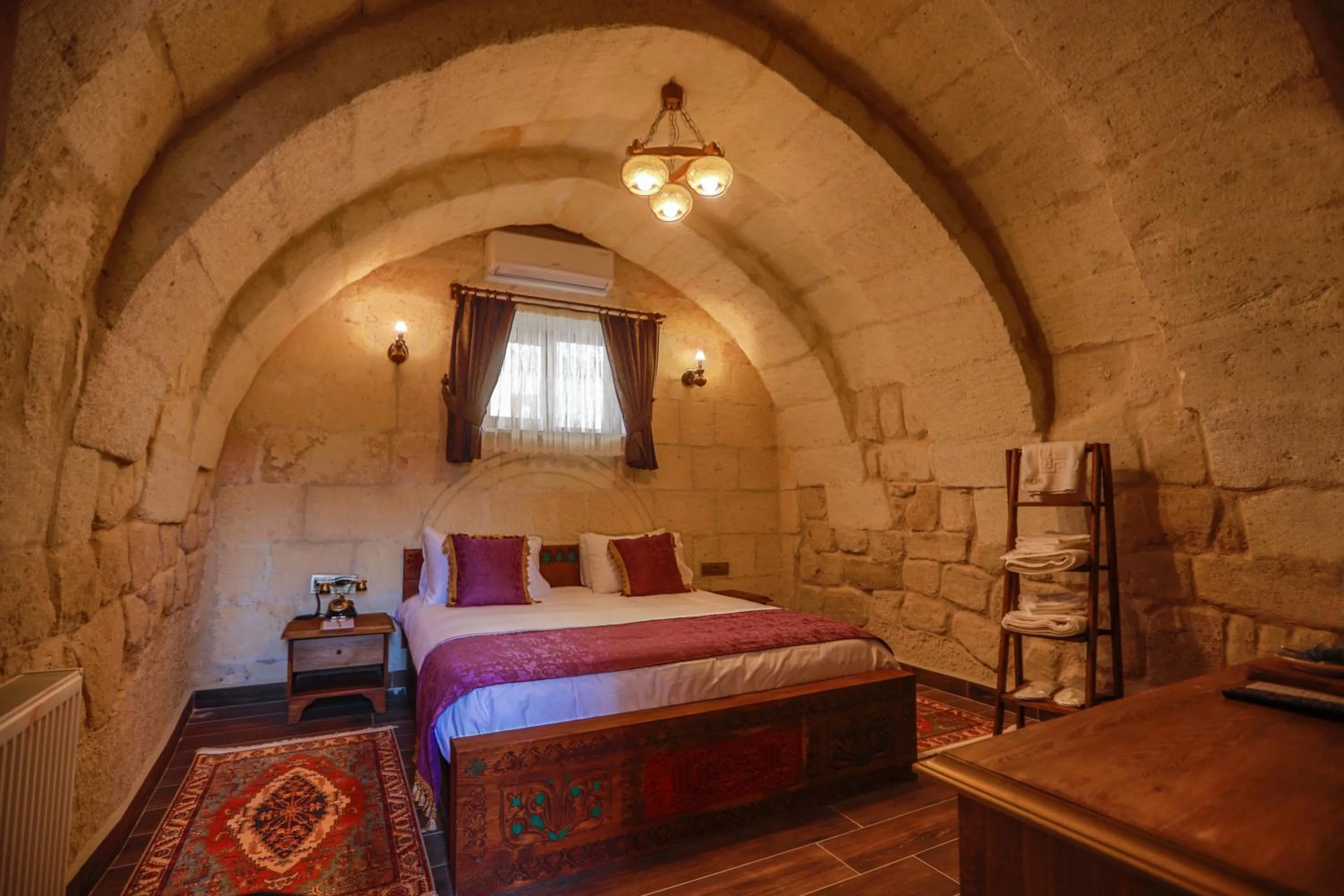 Bed in Ada Cave Suites