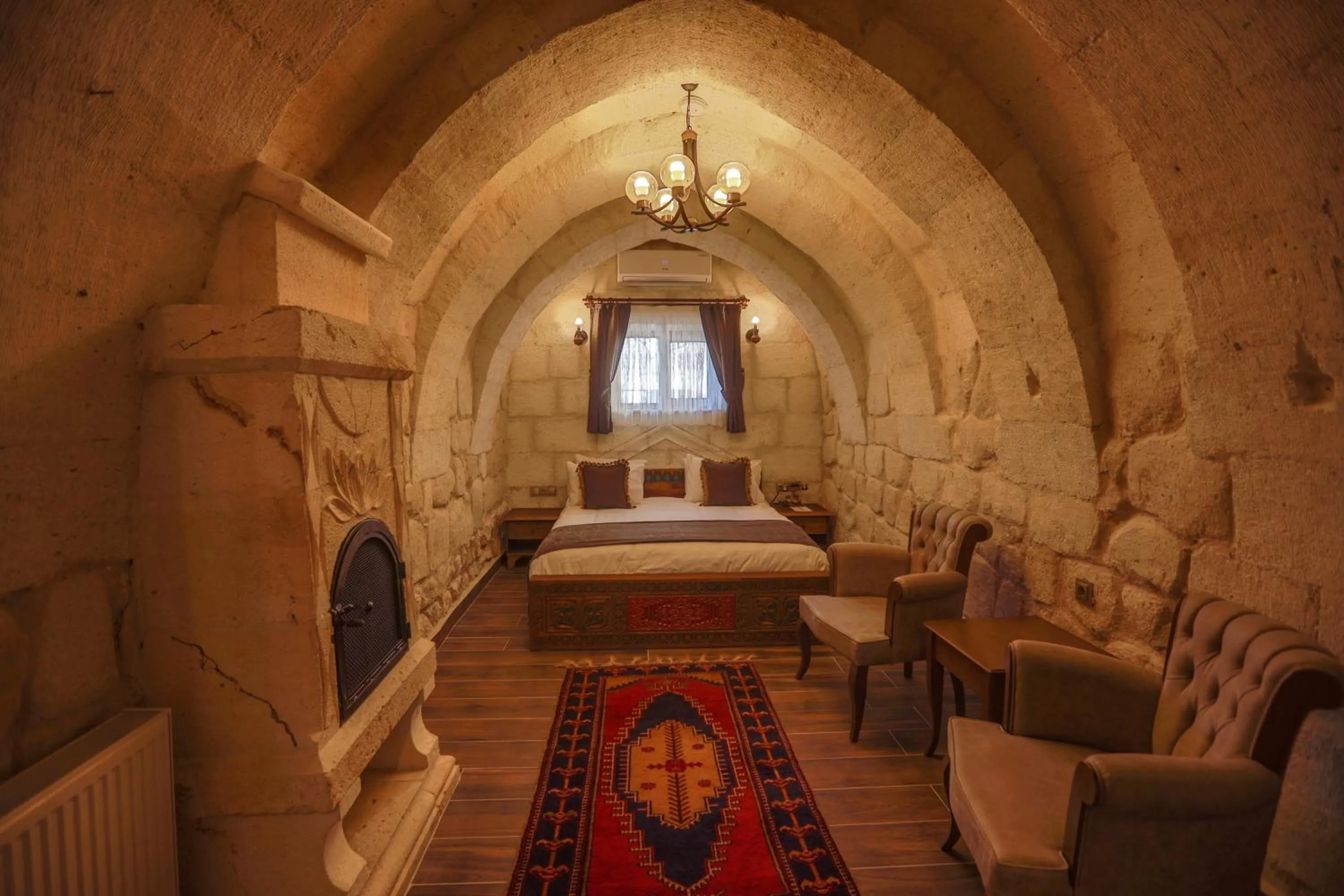 Bed in Ada Cave Suites