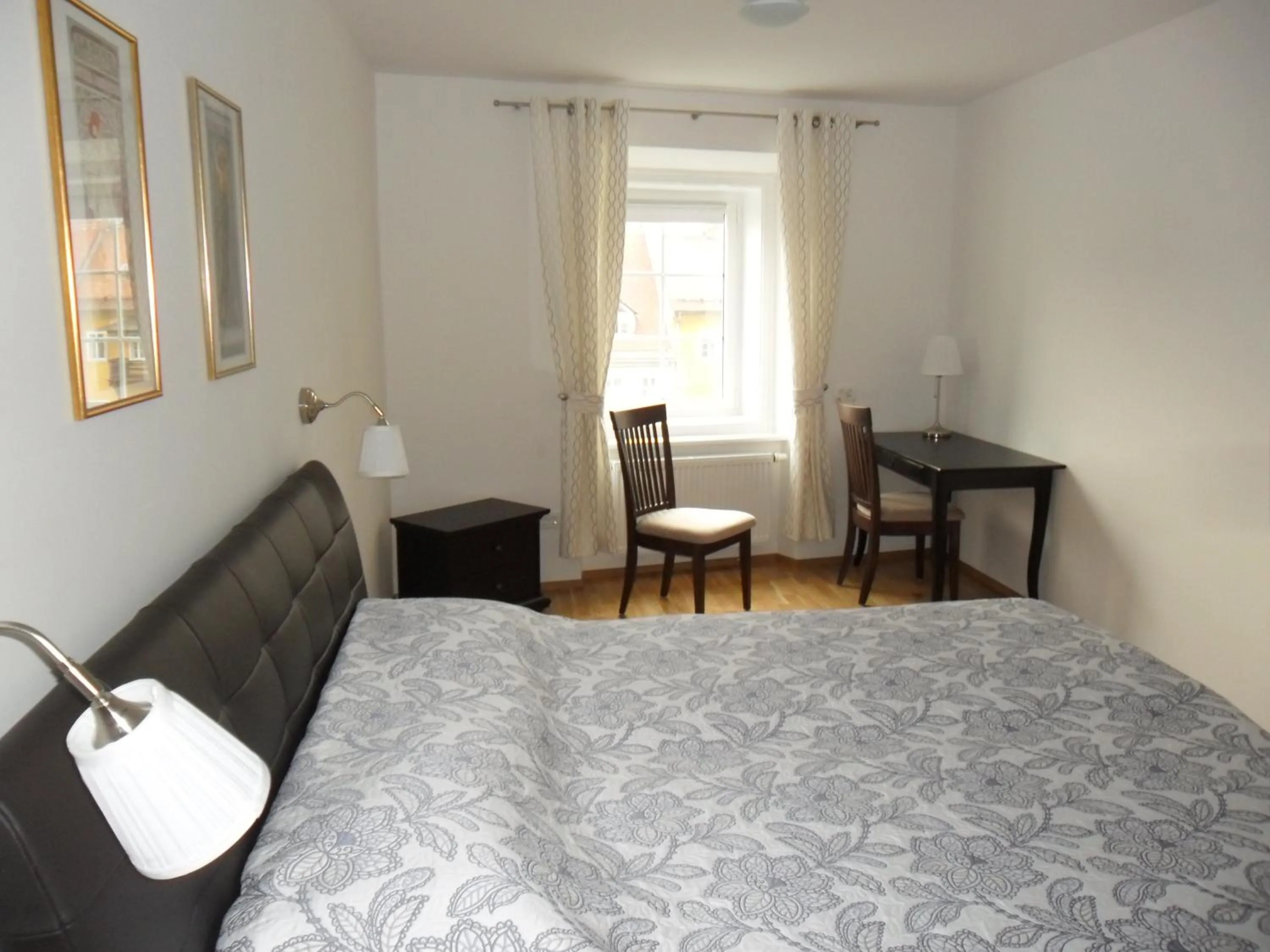 Bed in Kollmann Rooms and Apartments