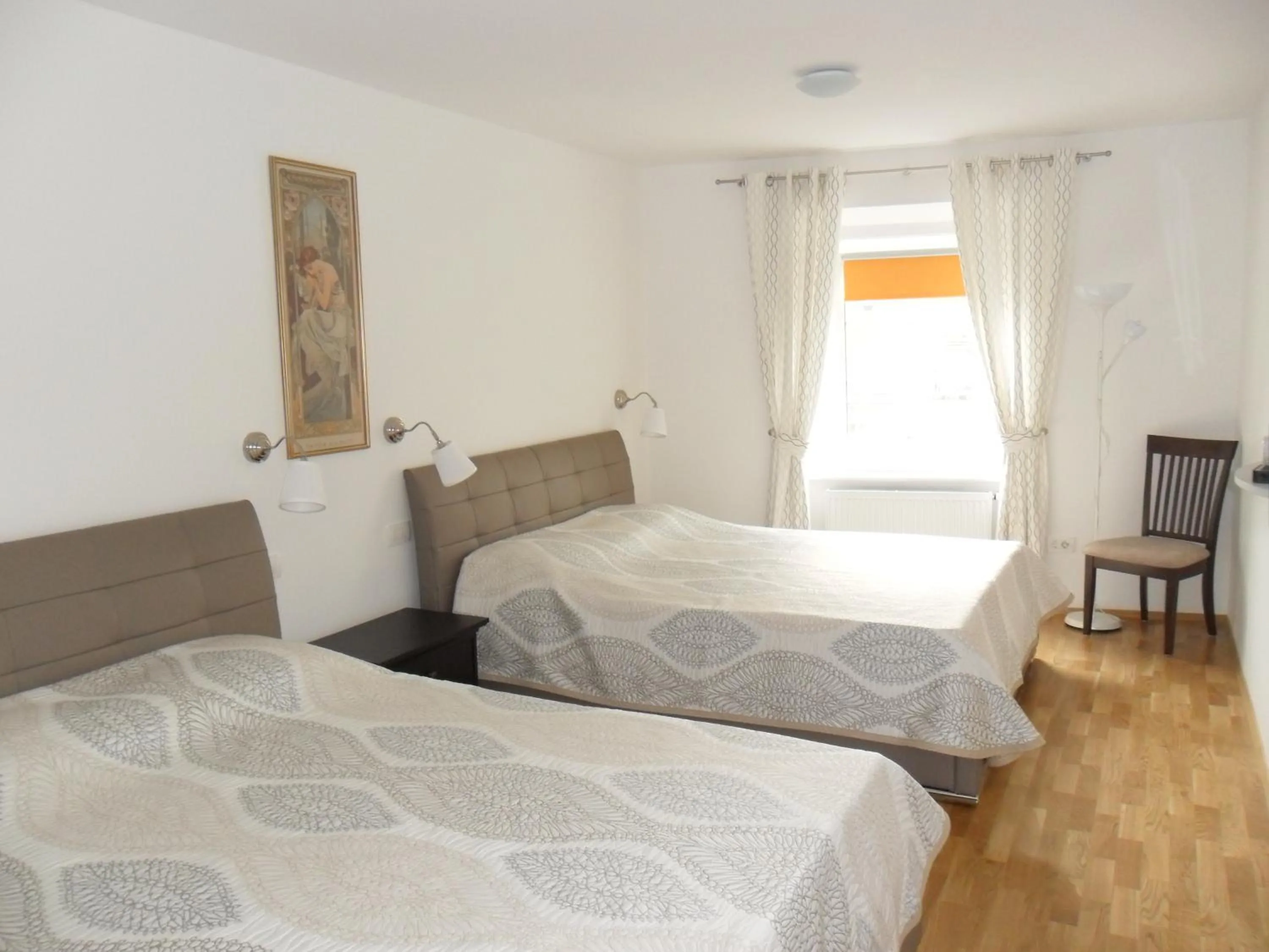 Bed in Kollmann Rooms and Apartments