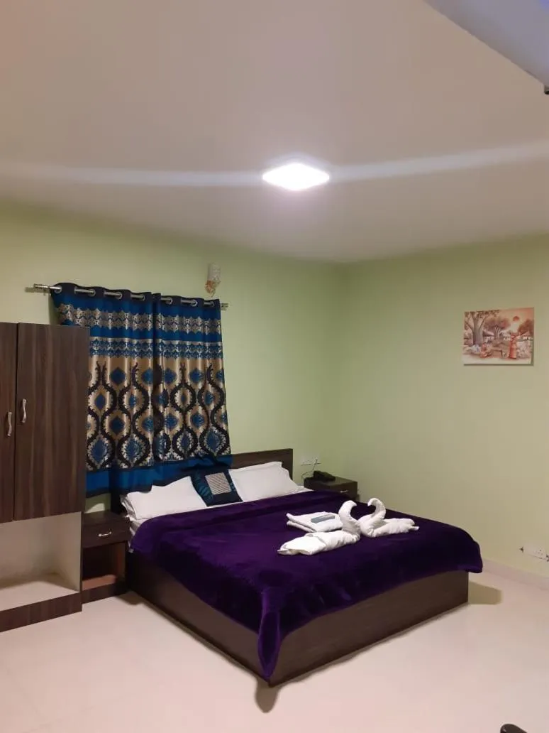 Bed in HAPPYSTAY rooms and cottages