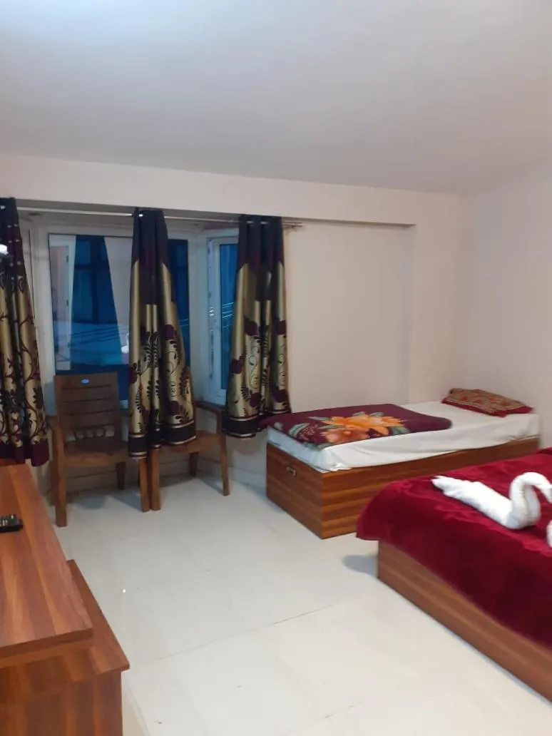 Bed in HAPPYSTAY rooms and cottages