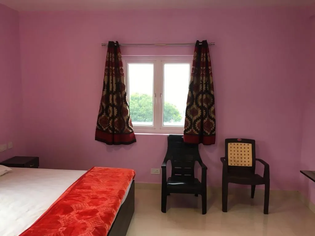 Bed in HAPPYSTAY rooms and cottages