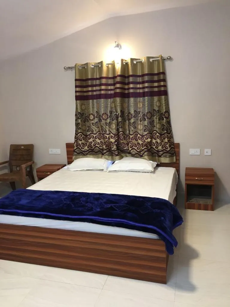 Bed in HAPPYSTAY rooms and cottages