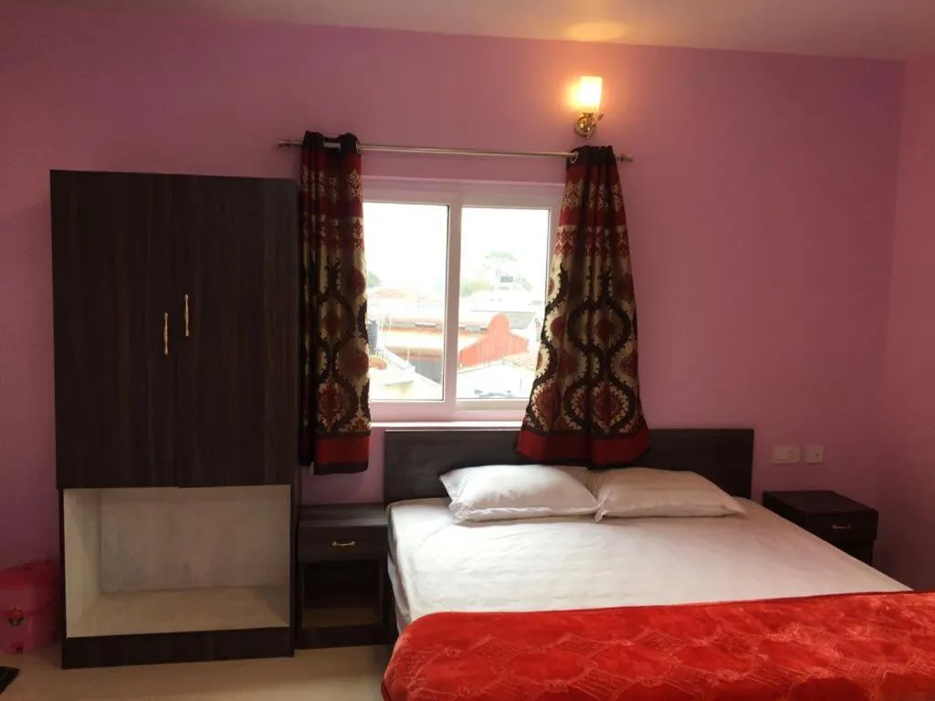 Bed in HAPPYSTAY rooms and cottages