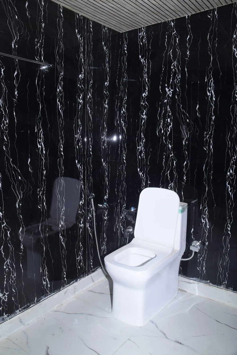 Toilet in Silver Dew Resorts and Restaurant