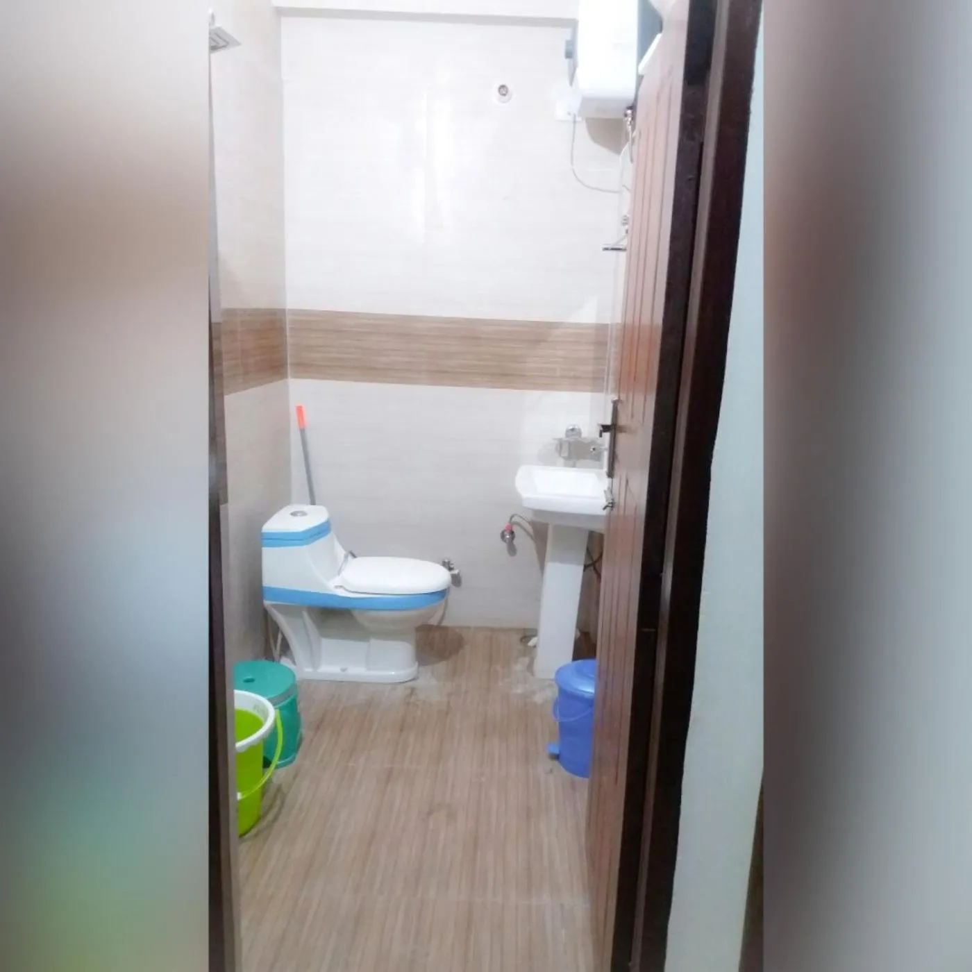 Toilet in Silver Dew Resorts and Restaurant