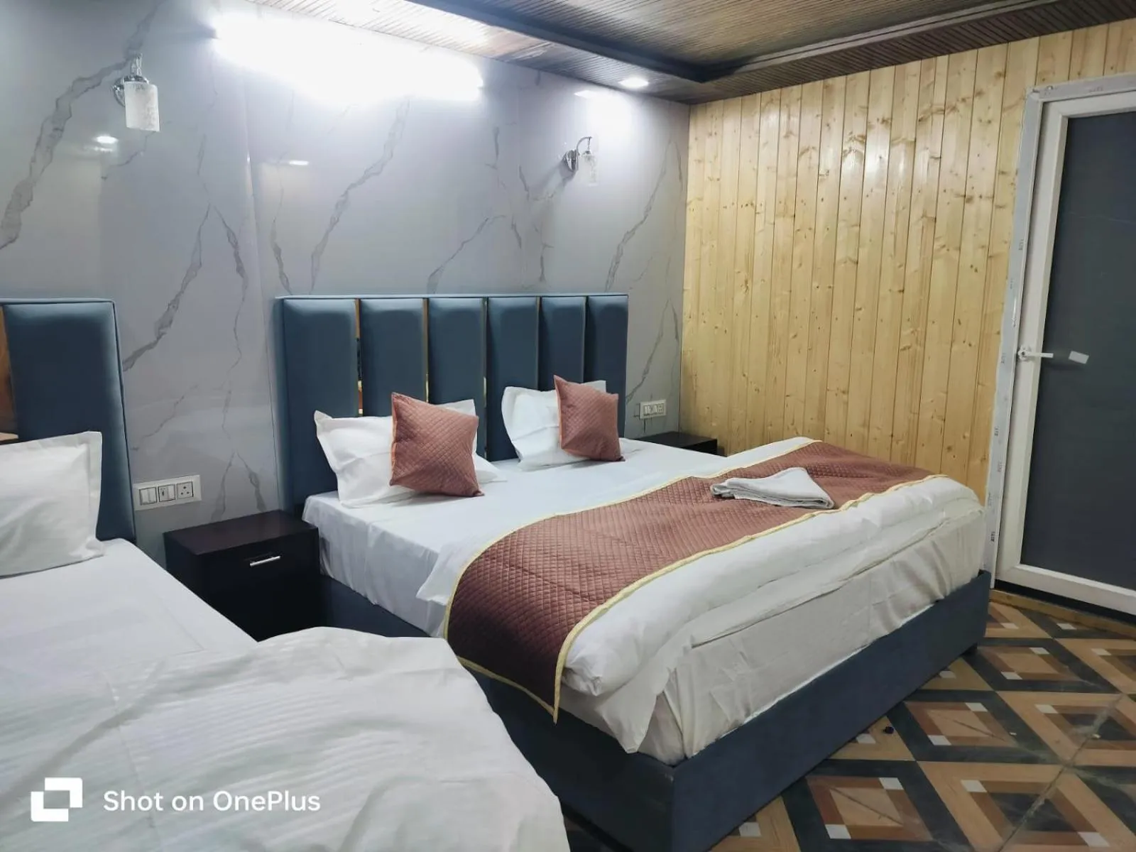 Bed in Silver Dew Resorts and Restaurant