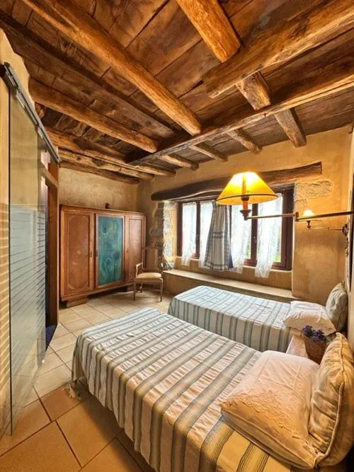 Bed in Casa Rural Ecológica Kaaño Etxea