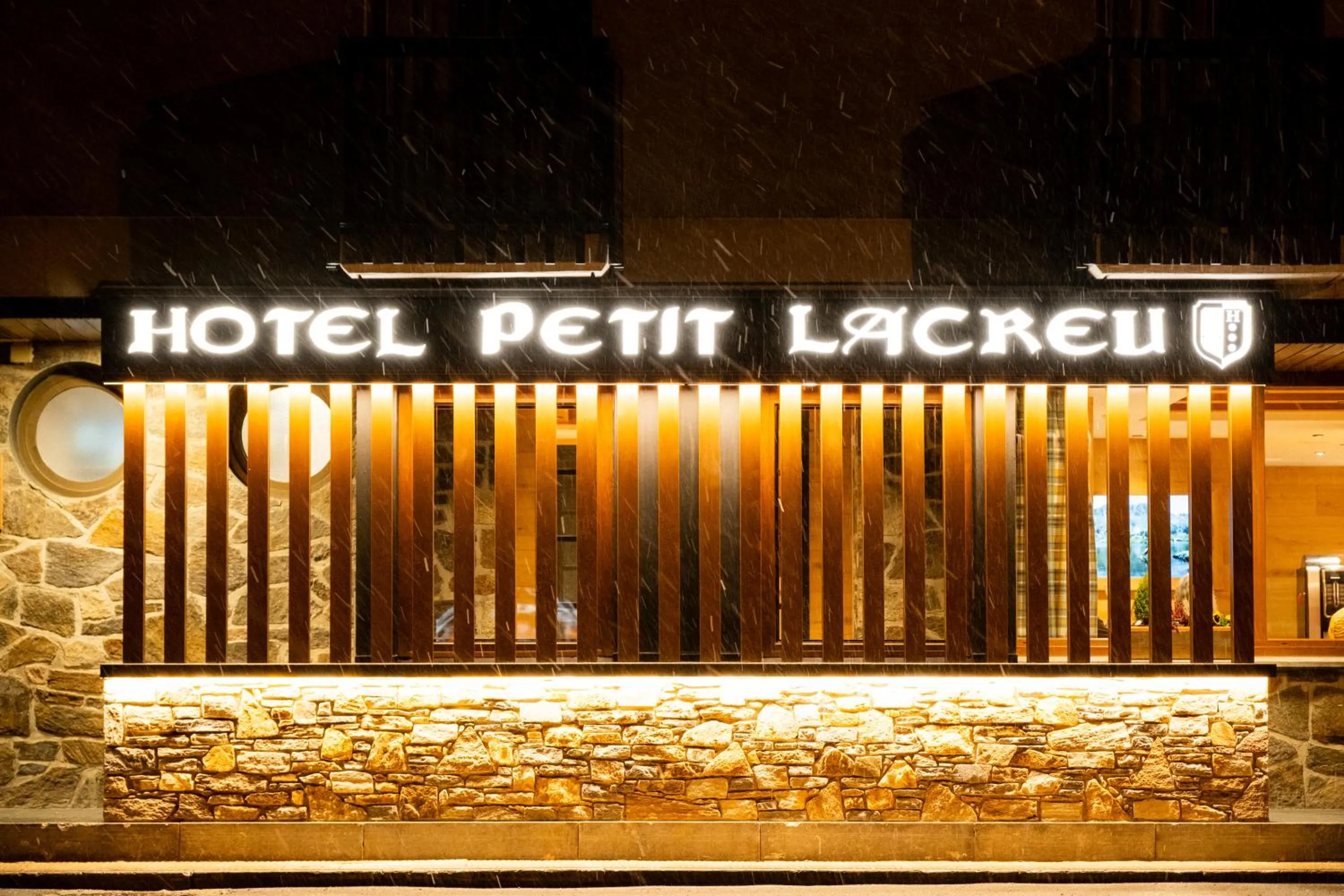 Property logo or sign in Hotel Petit Lacreu