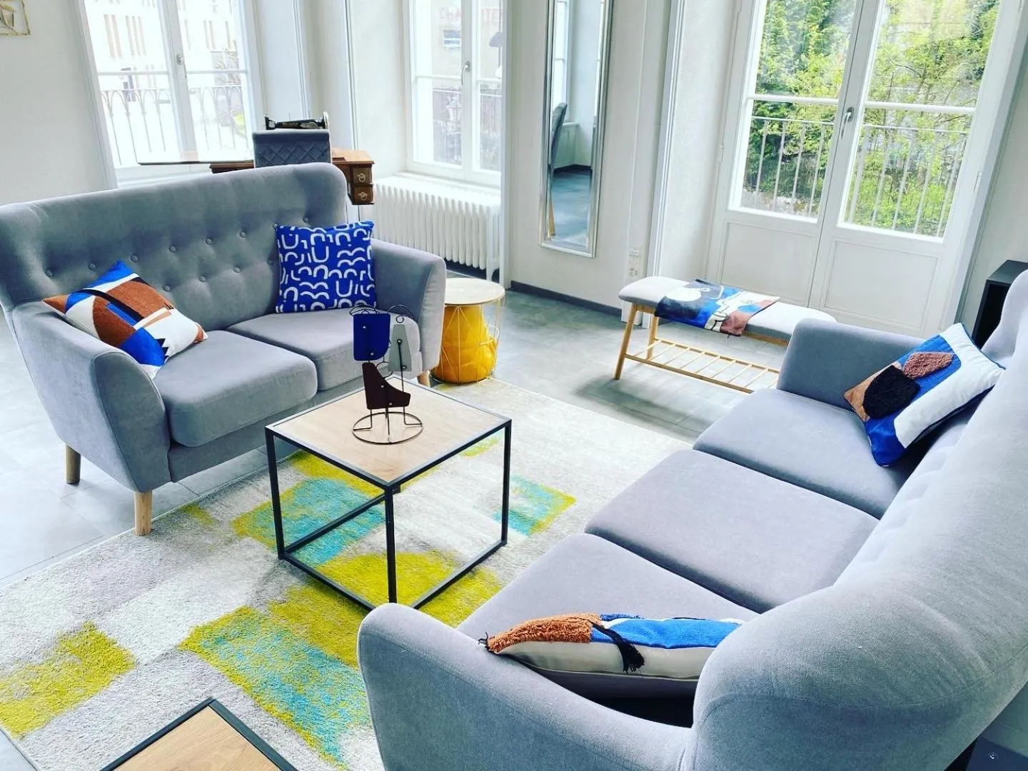 Living room in The 5 Continents I by Stay Swiss