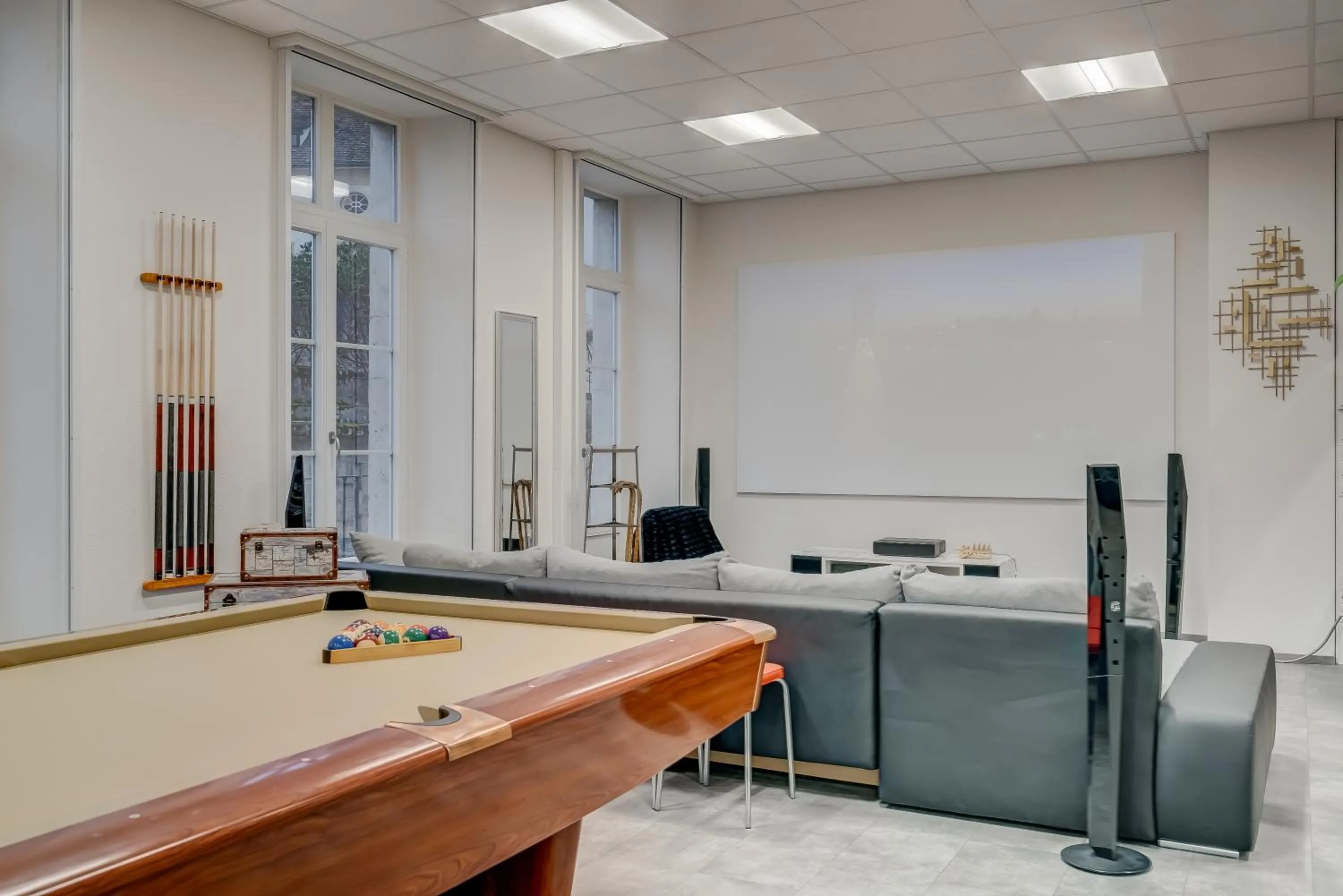 Living room in The 5 Continents I by Stay Swiss