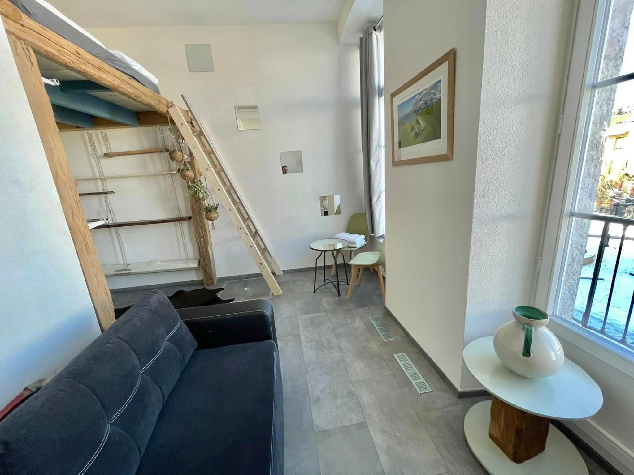 Seating area in The 5 Continents I by Stay Swiss