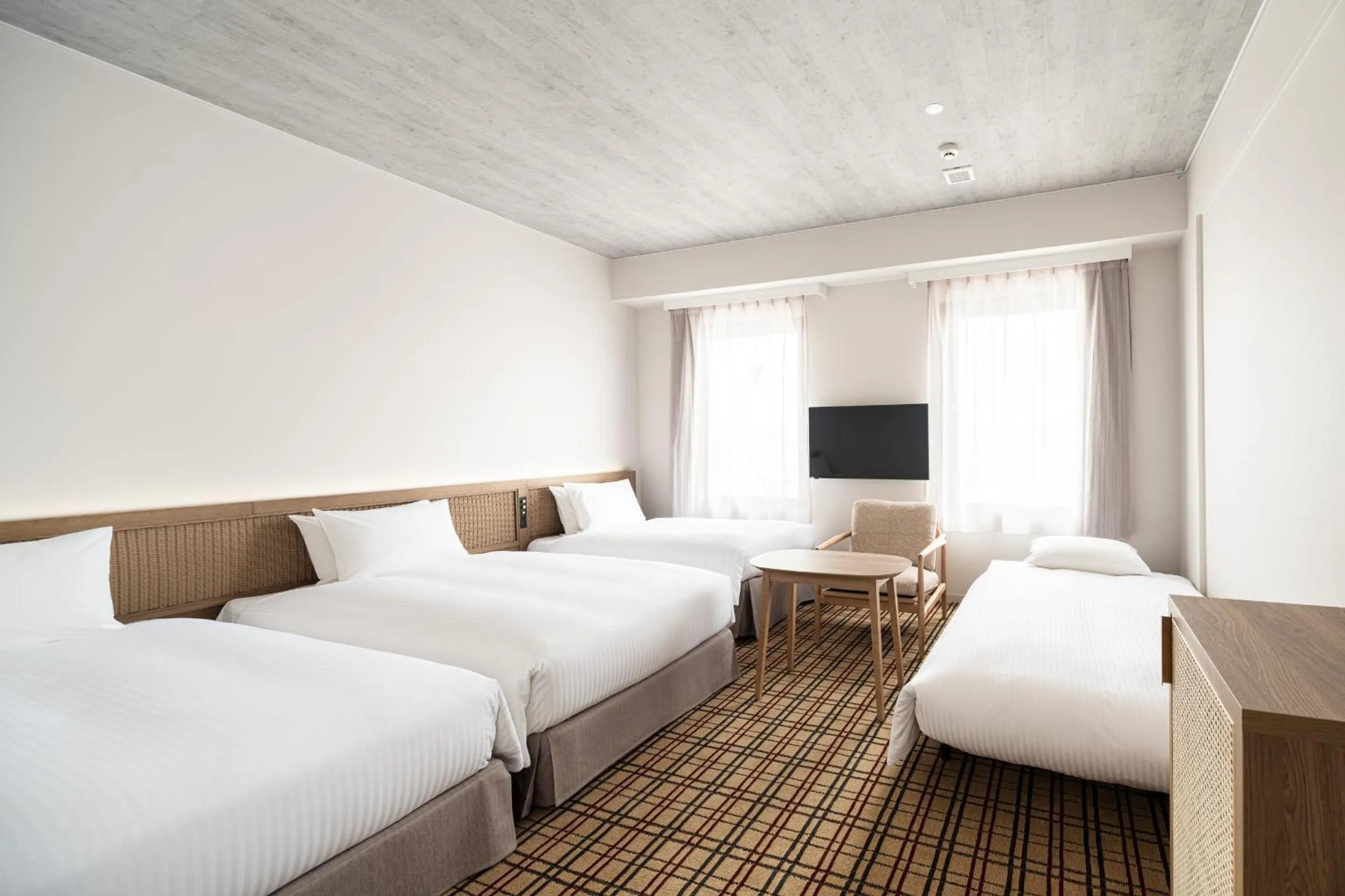 Photo of the whole room, Bed in Nest Hotel Naha Kumoji