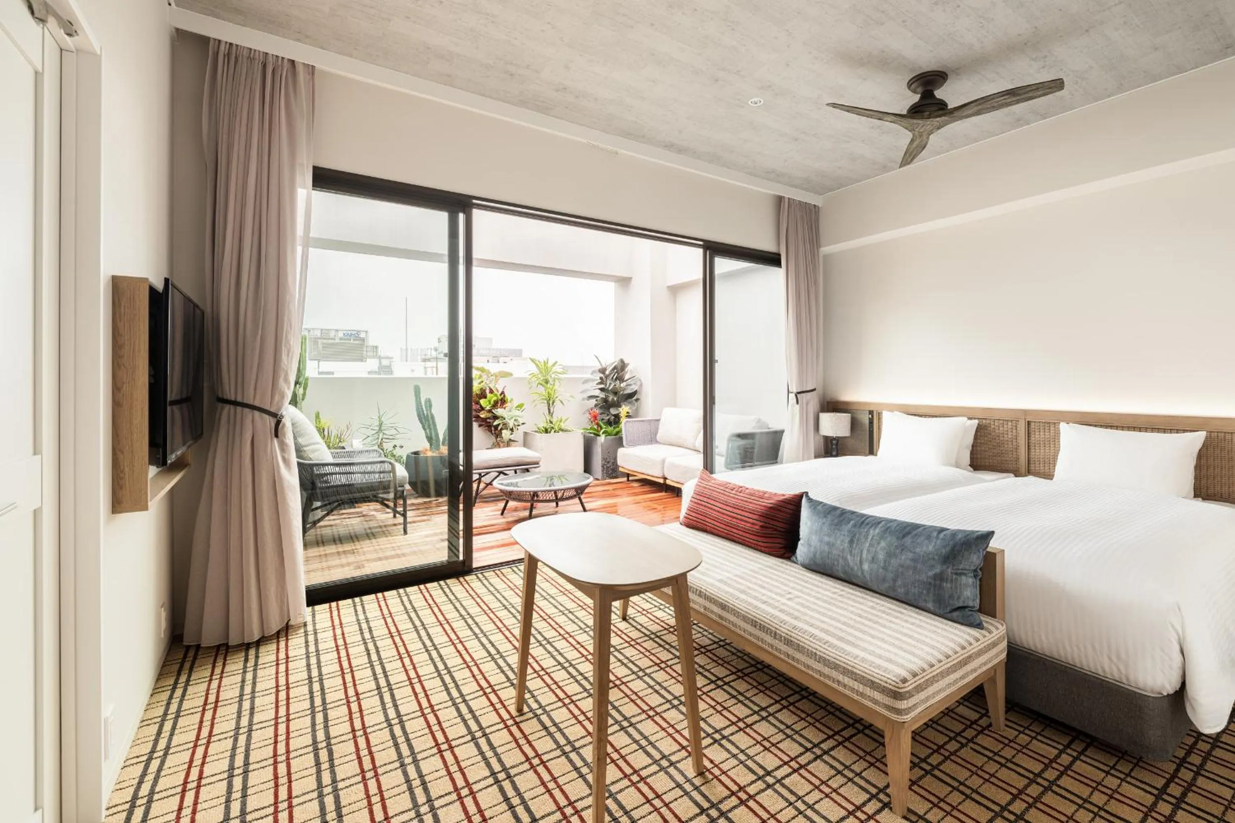 Balcony/Terrace, Bed in Nest Hotel Naha Kumoji