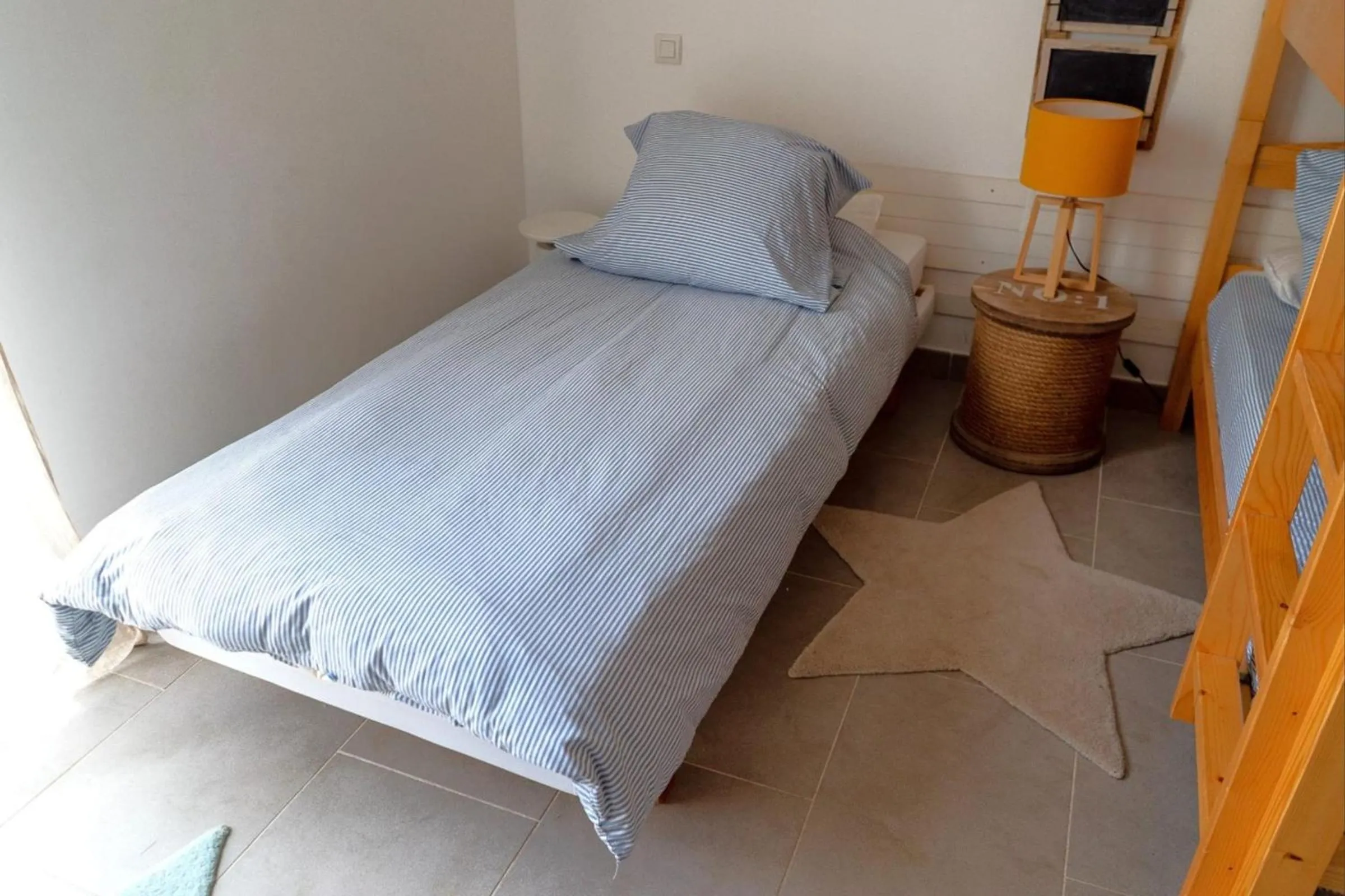 Bed in Appartement Les Hameaux de Pinarello