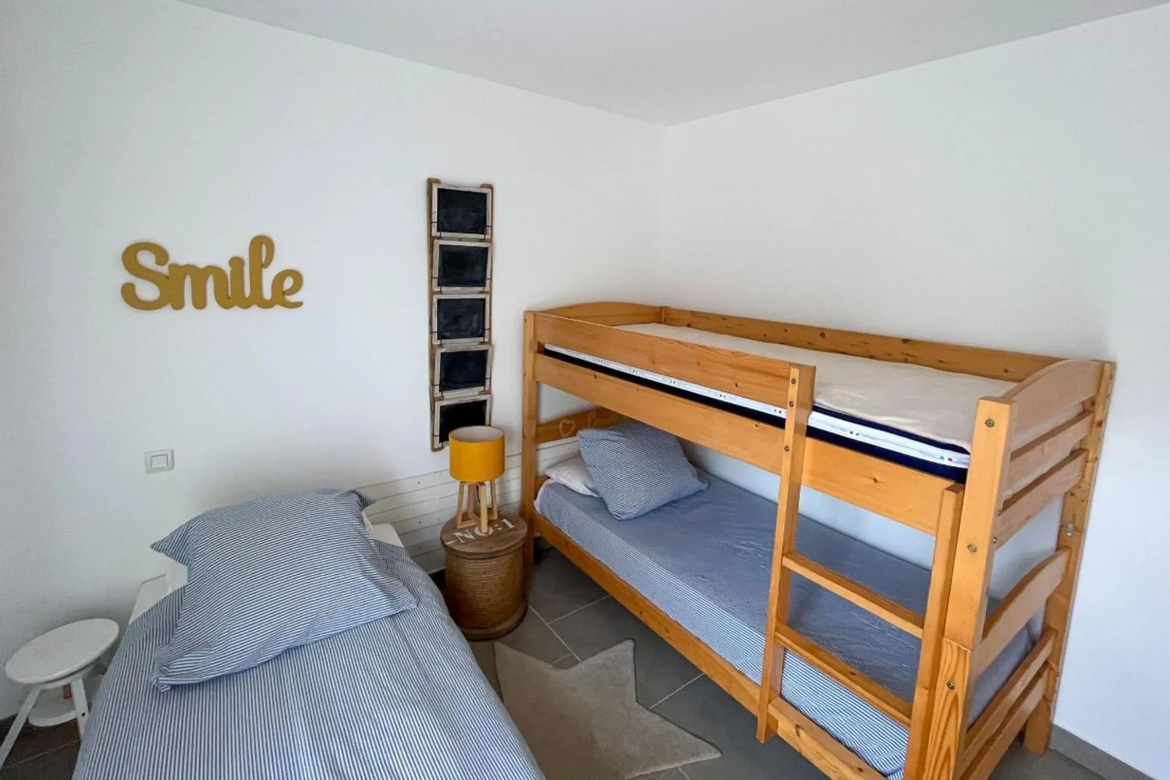 Bed in Appartement Les Hameaux de Pinarello