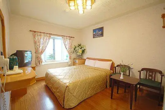 Bed in Formosa Vacation Village Homestay Bed in Formosa Vacation Village Homestay