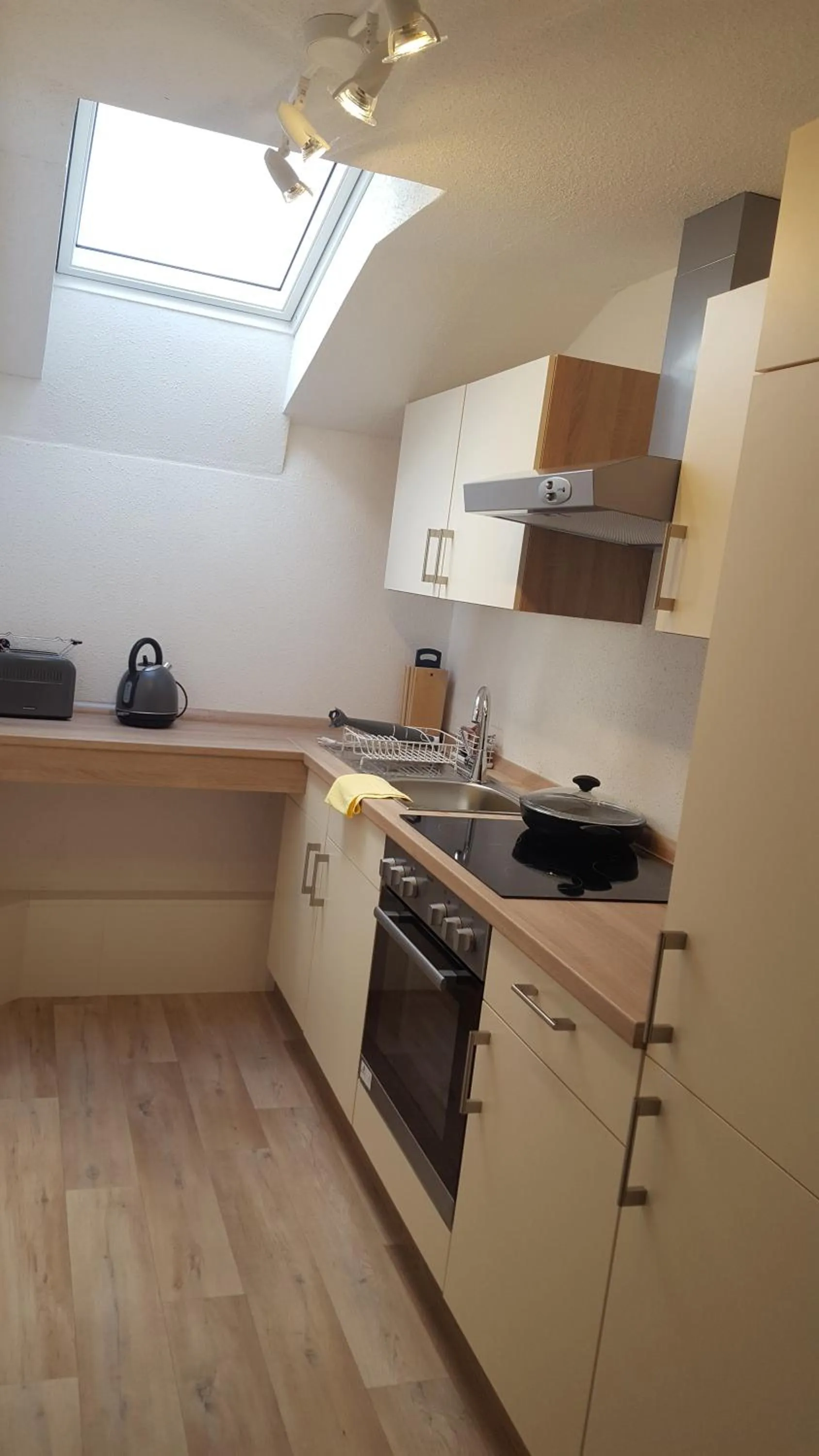 Kitchen or kitchenette in Room and kitchen im Katerberg