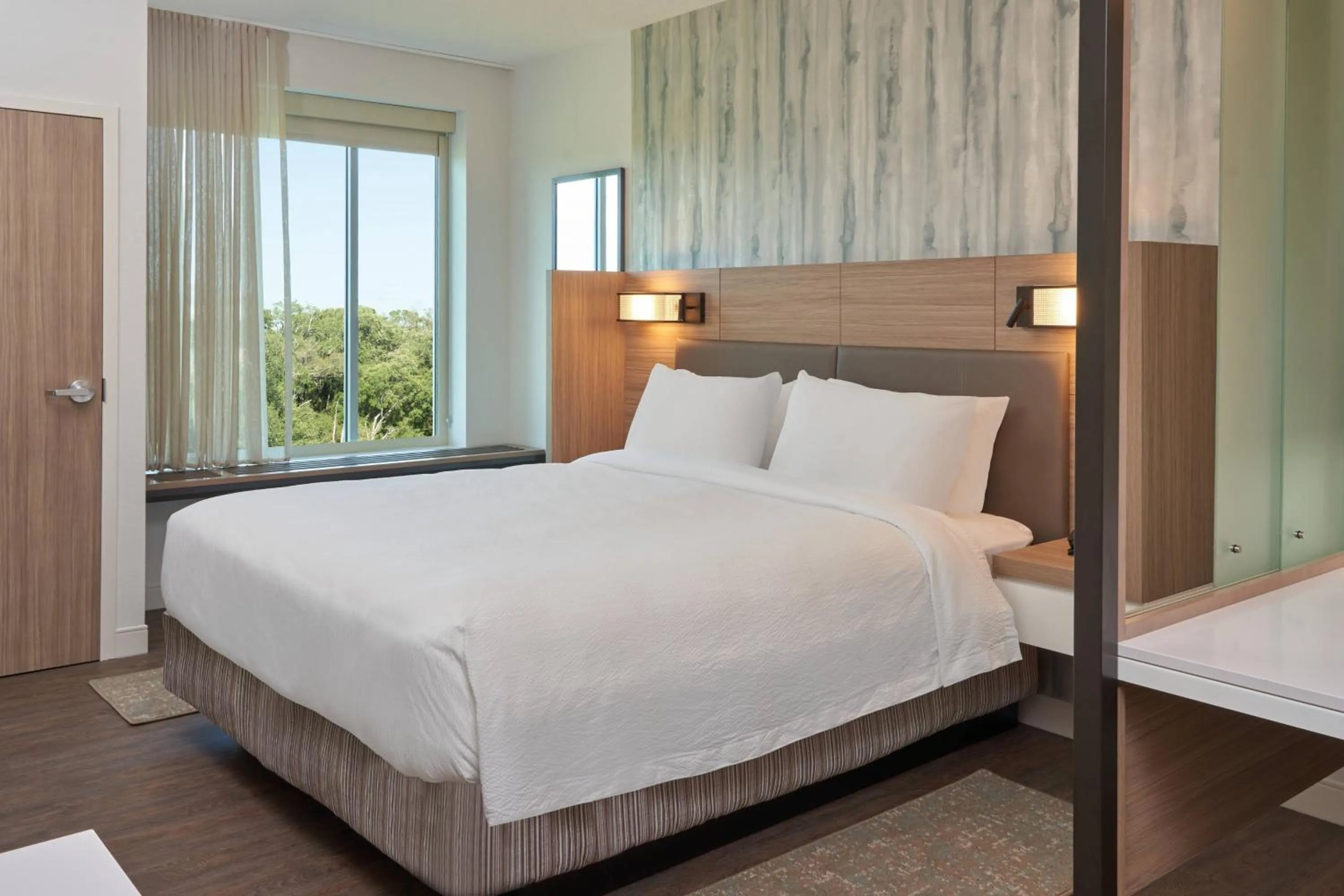 Photo of the whole room, Bed in SpringHill Suites by Marriott Orlando Lake Nona