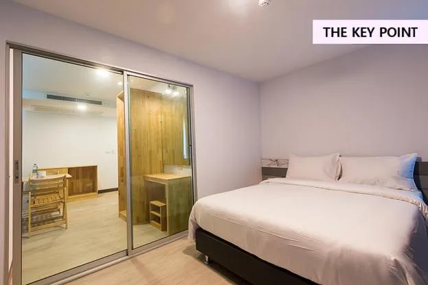 Bed in The Key Point Hotel