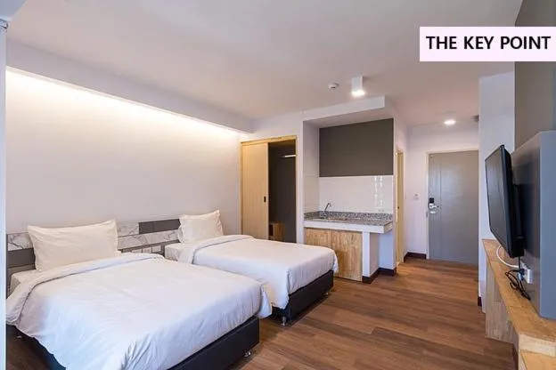 Bed in The Key Point Hotel