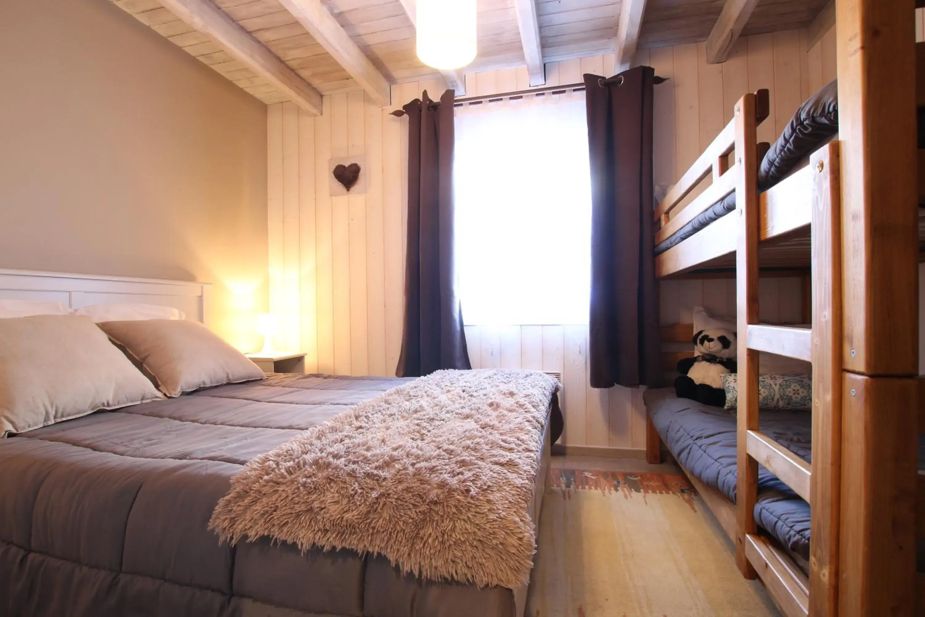 Bed in Chalet Changalan Bed in Chalet Changalan