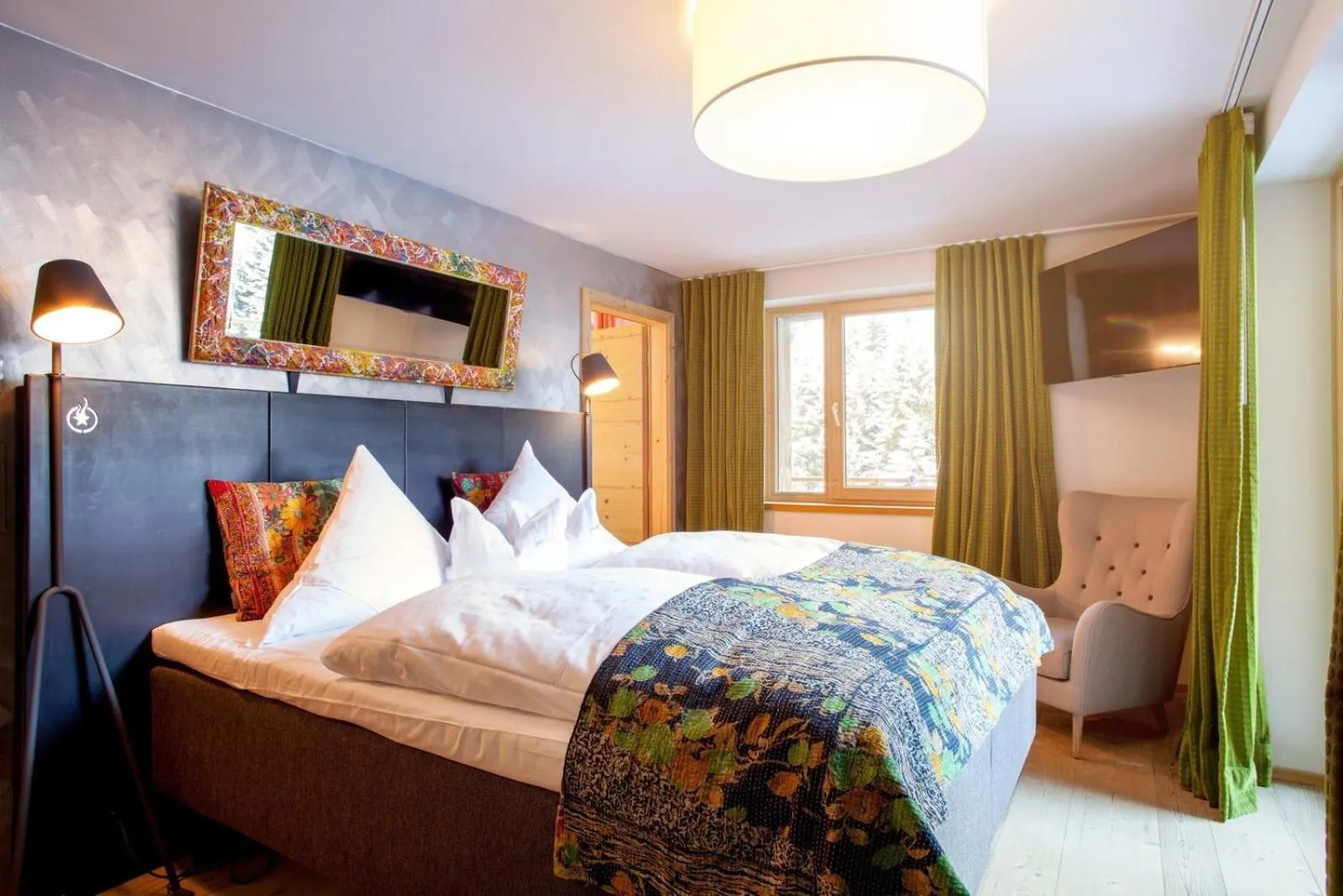 Bed in Raffl's Tyrol Hotel