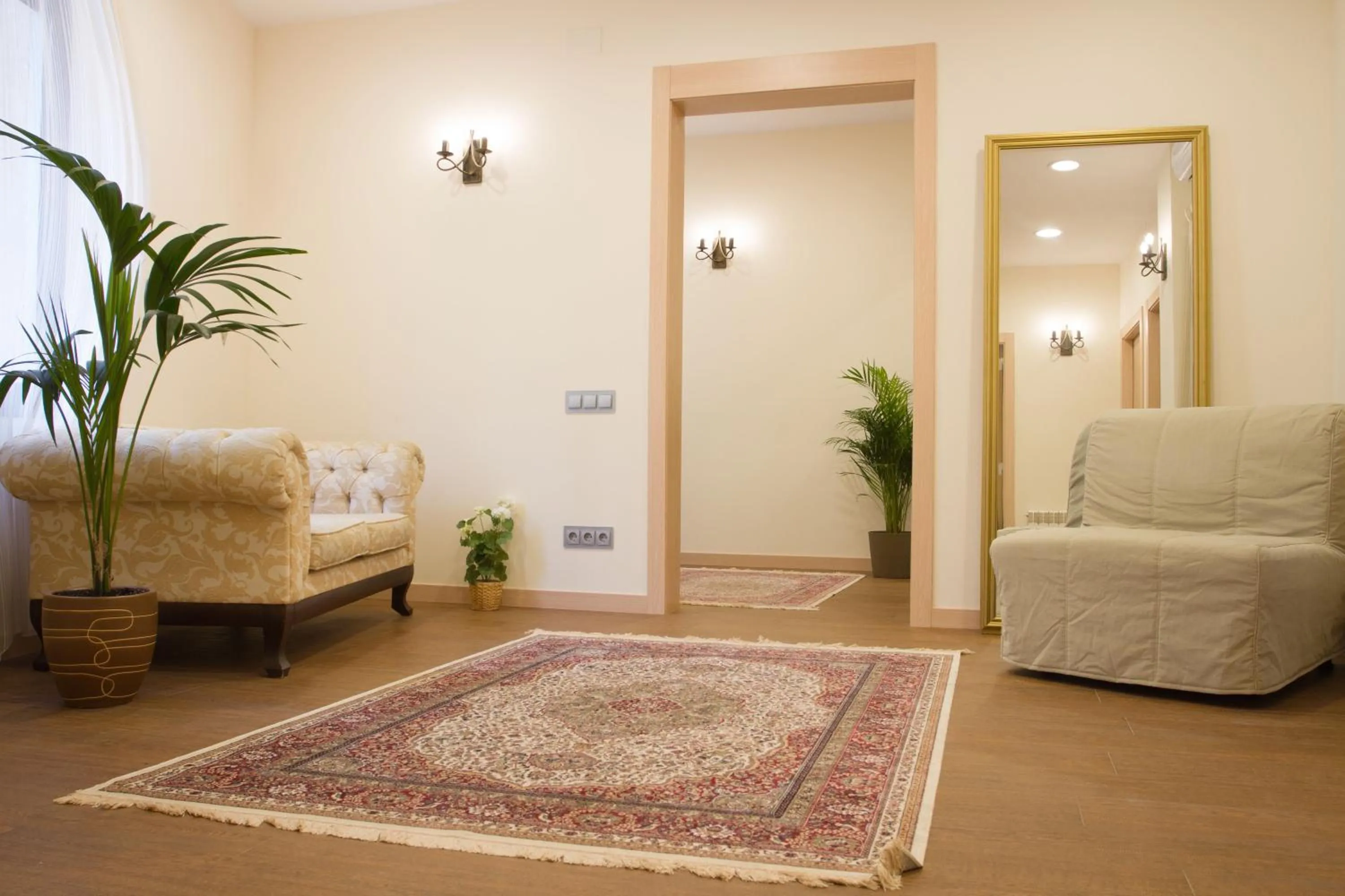 Communal lounge/ TV room in Hostal Excellence