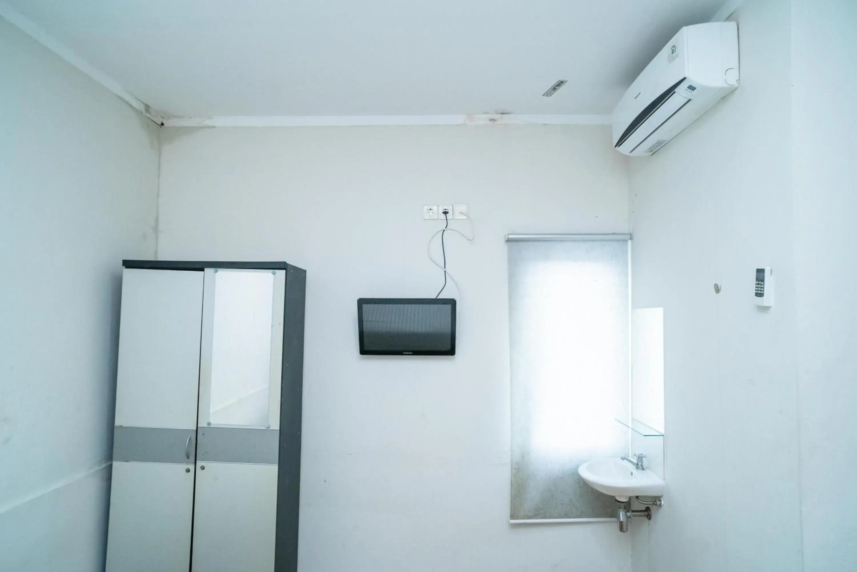 Bed in 77 Guest House Serpong Mitra RedDoorz Bed in 77 Guest House Serpong Mitra RedDoorz