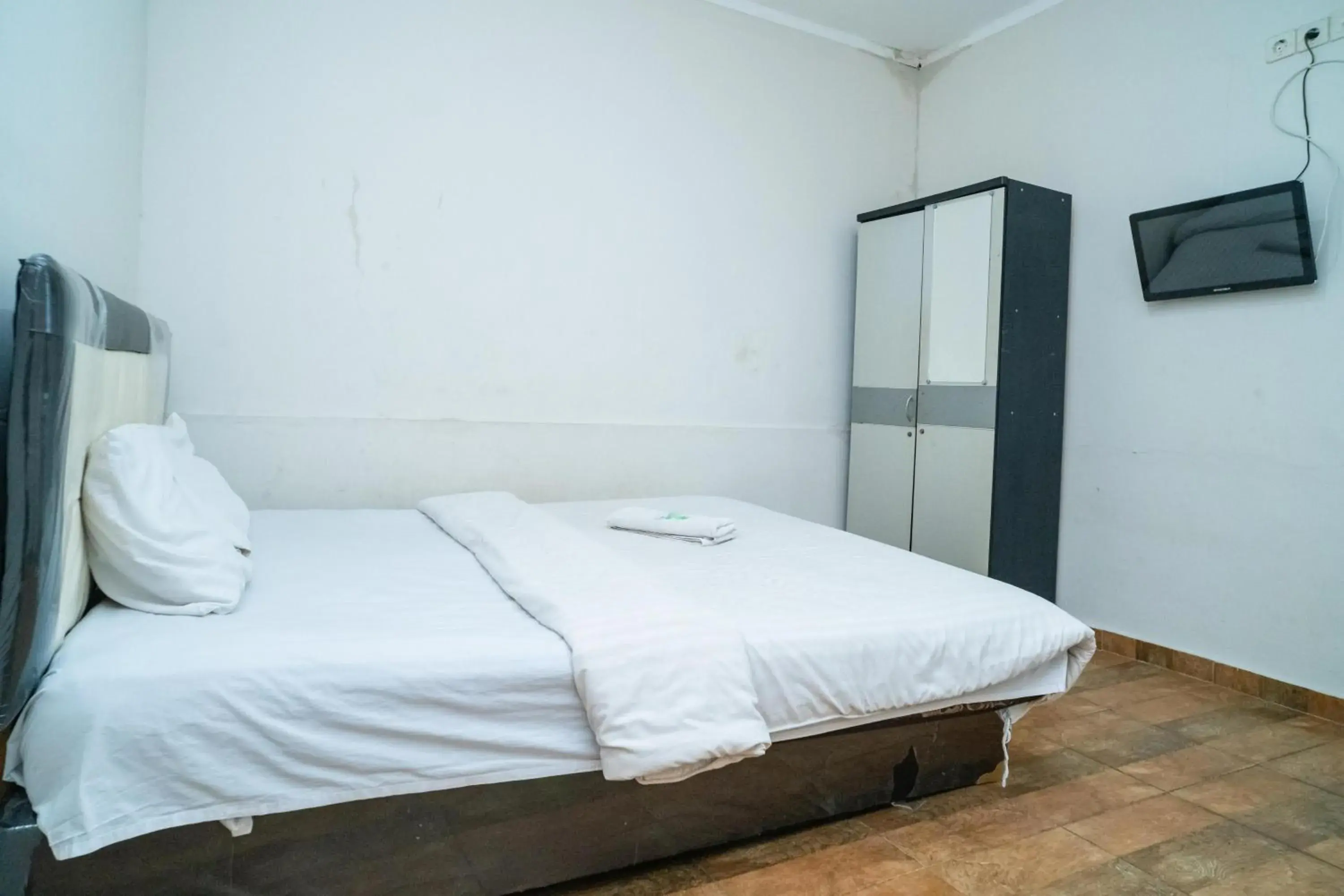 Bed in 77 Guest House Serpong Mitra RedDoorz Bed in 77 Guest House Serpong Mitra RedDoorz