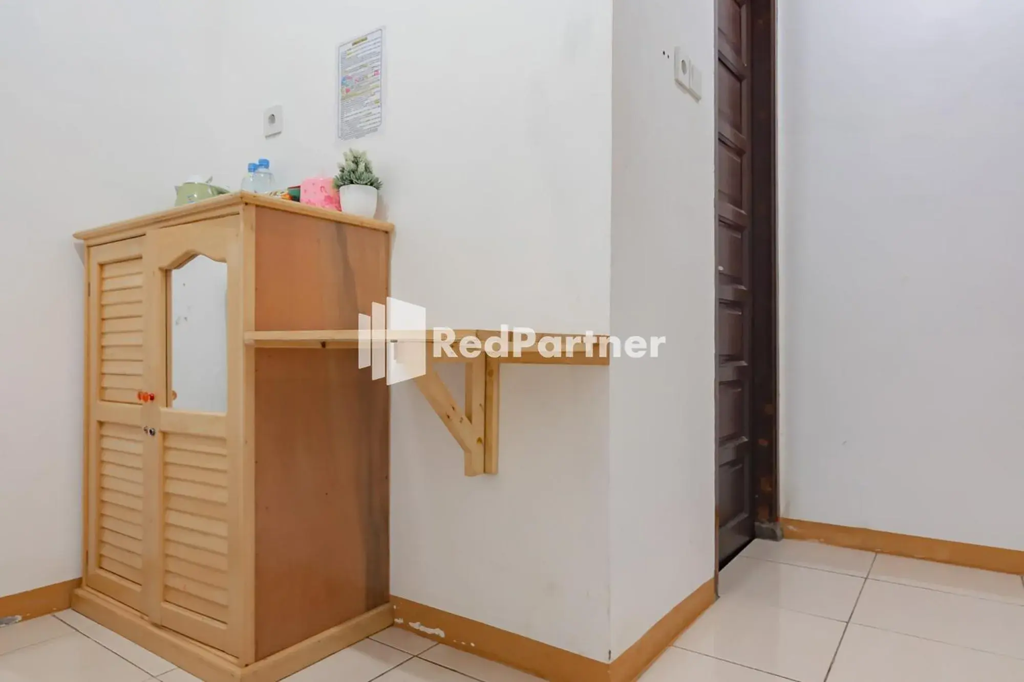 Bedroom in Langkar Guest House Syariah Mitra RedDoorz Bedroom in Langkar Guest House Syariah Mitra RedDoorz