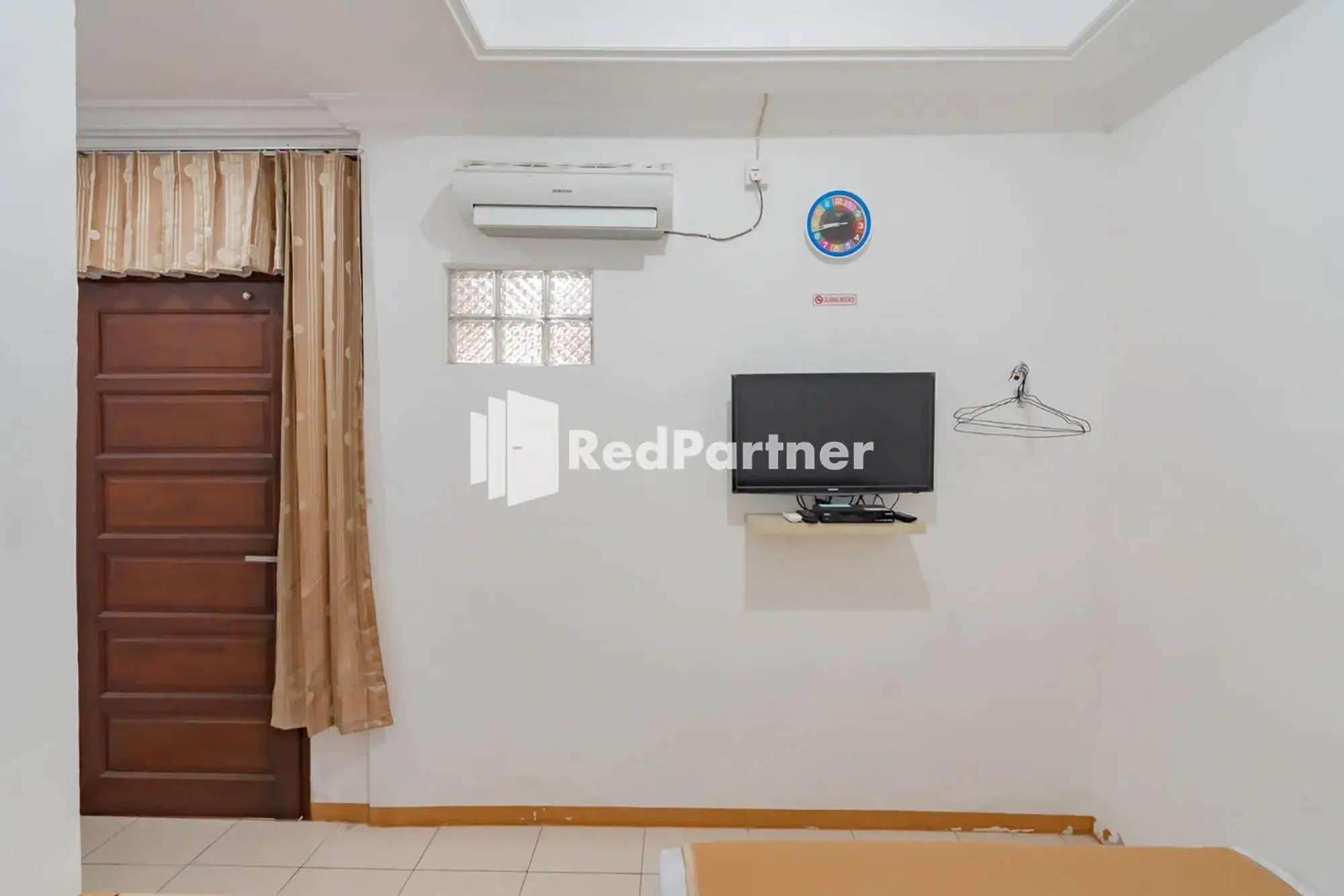 Bedroom in Langkar Guest House Syariah Mitra RedDoorz Bedroom in Langkar Guest House Syariah Mitra RedDoorz