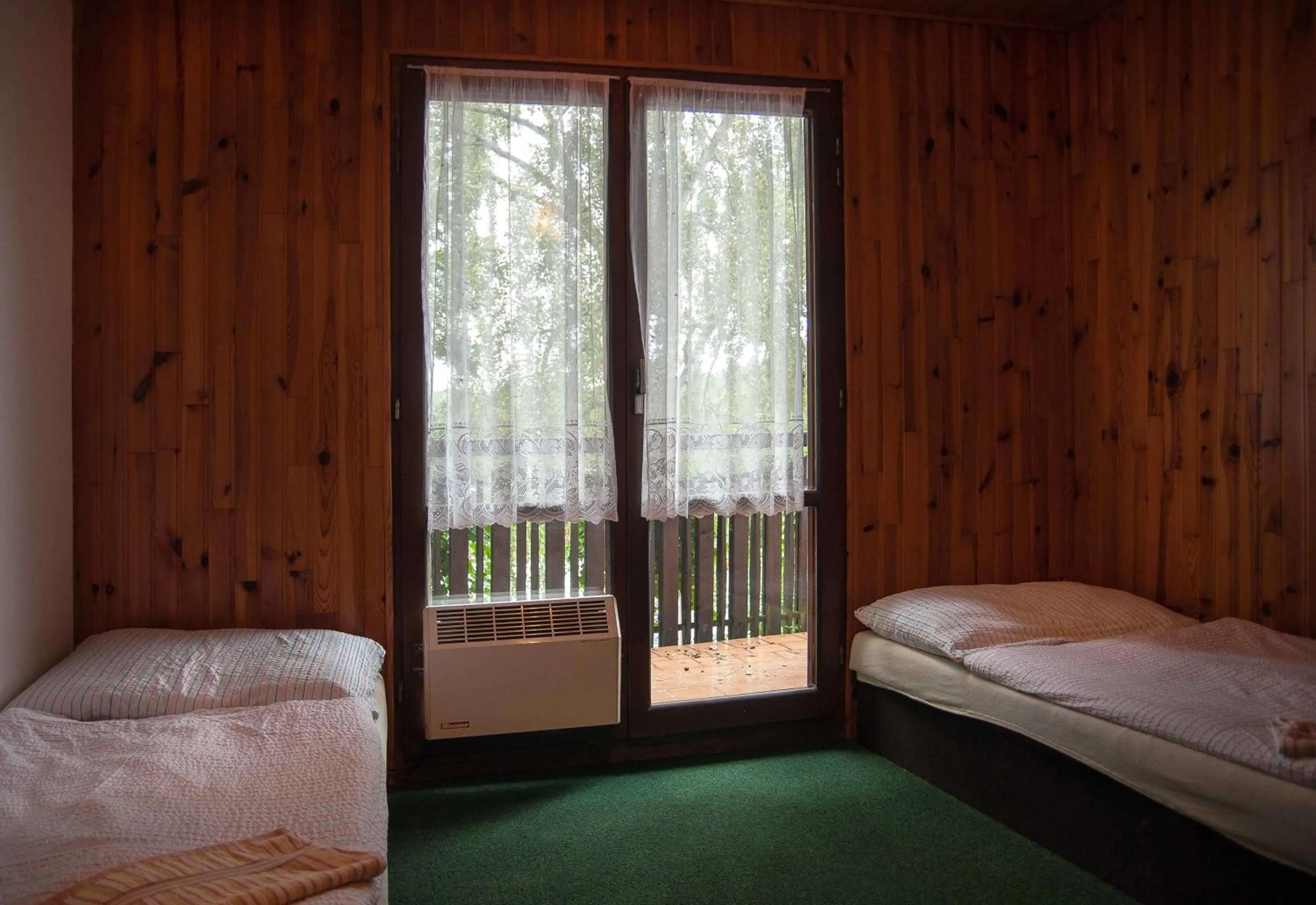 Bed in Lovecký hotel Jívák