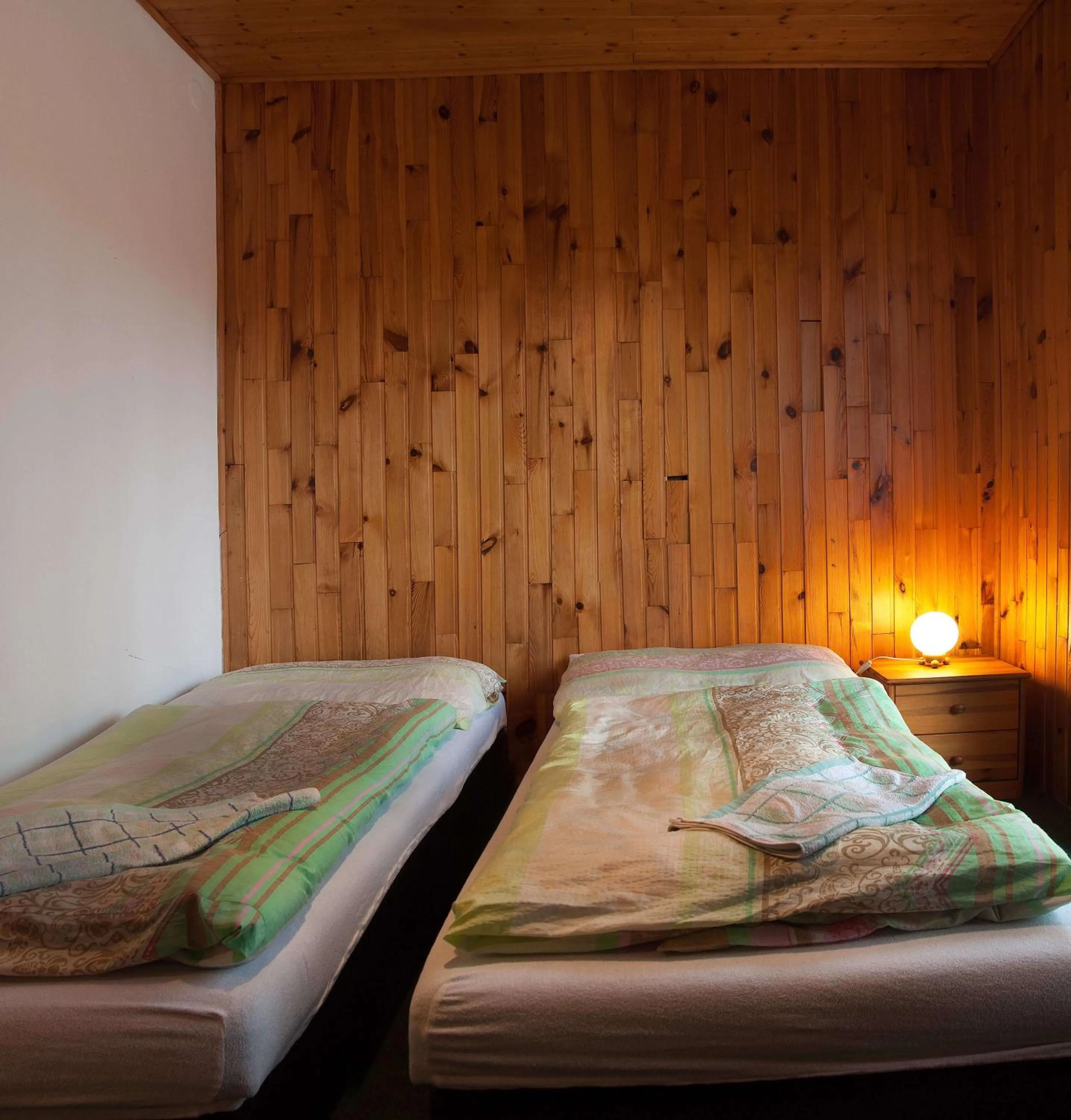 Bed in Lovecký hotel Jívák