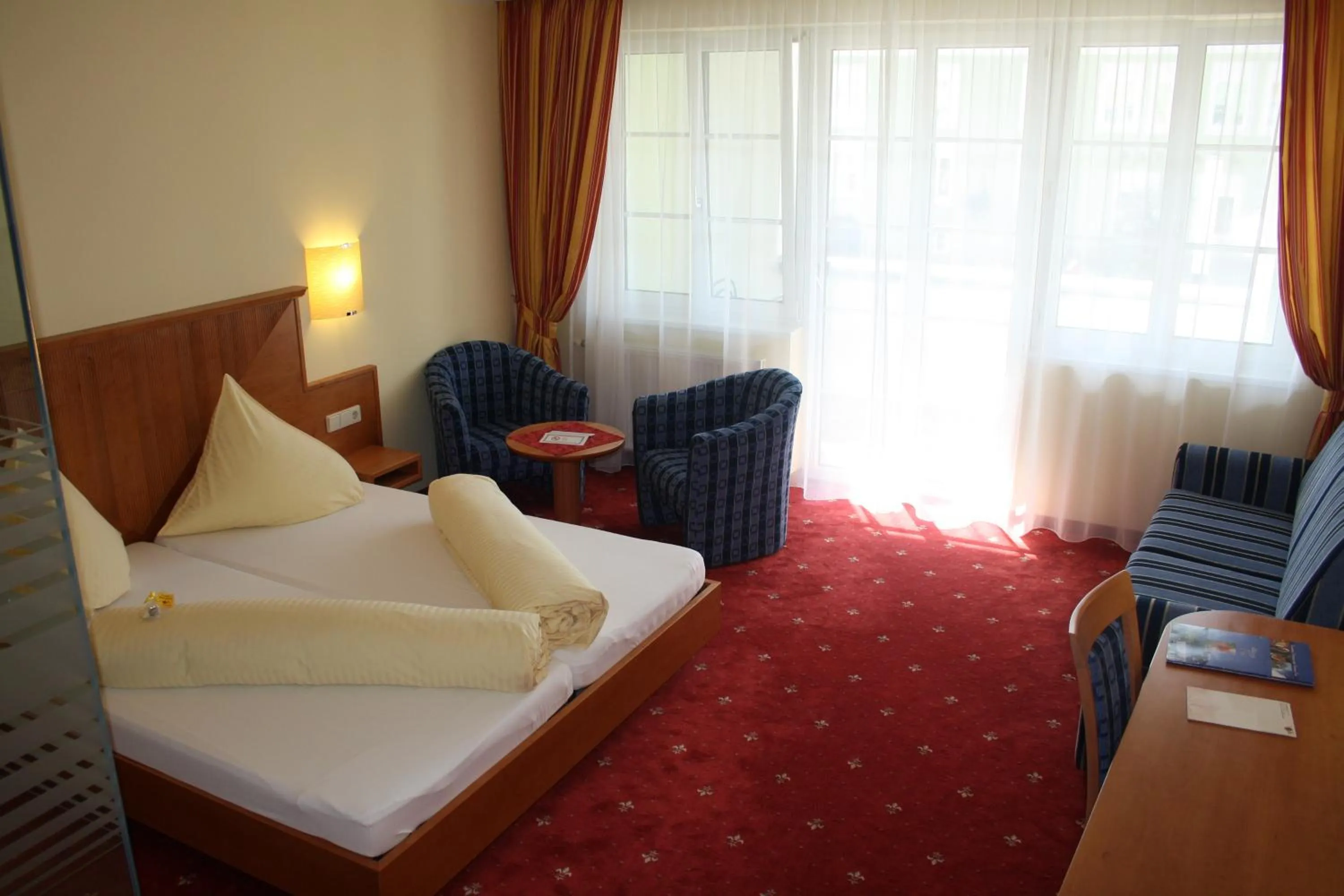 Decorative detail, Bed in Posthotel Radstadt