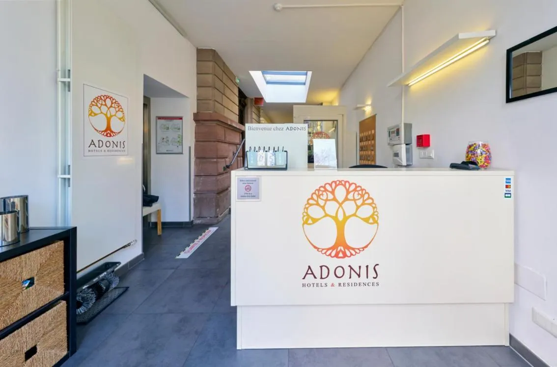 Property logo or sign in Adonis Hotel Strasbourg
