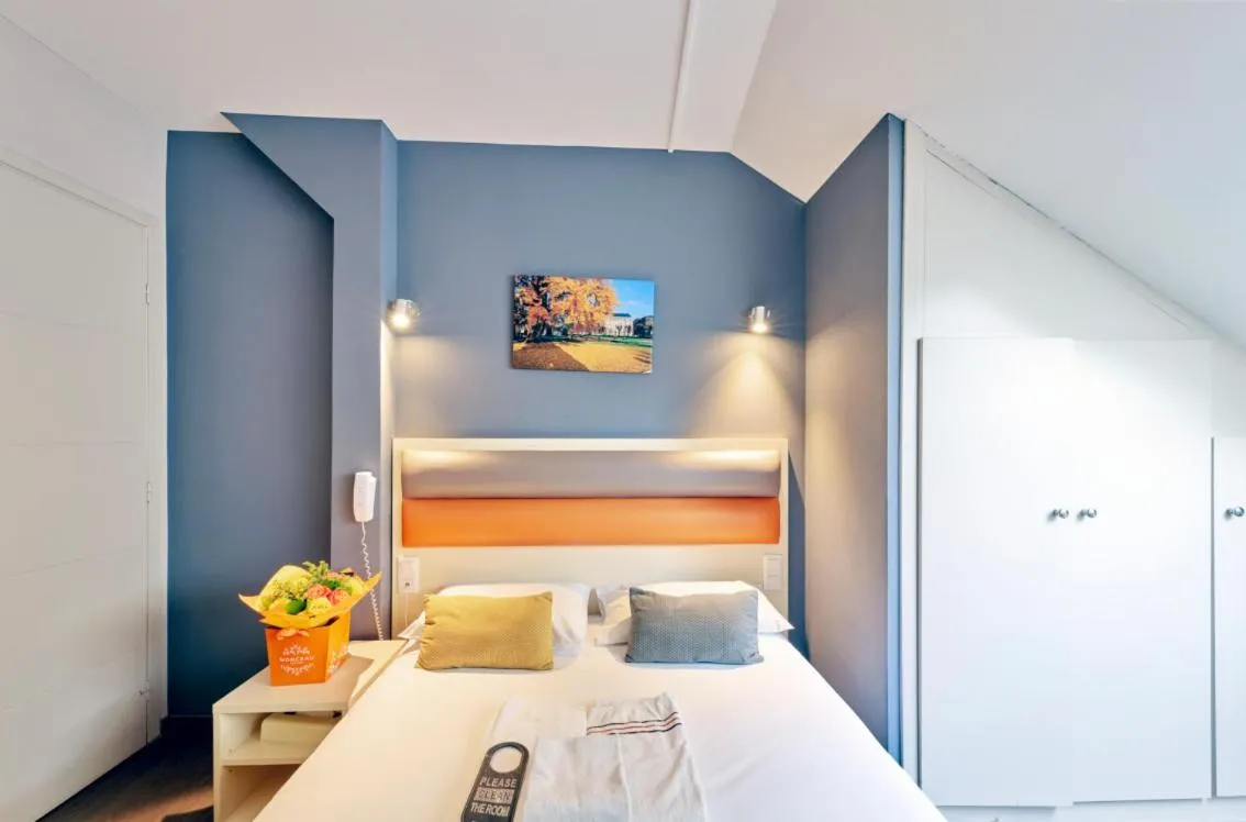 Bed in Adonis Hotel Strasbourg