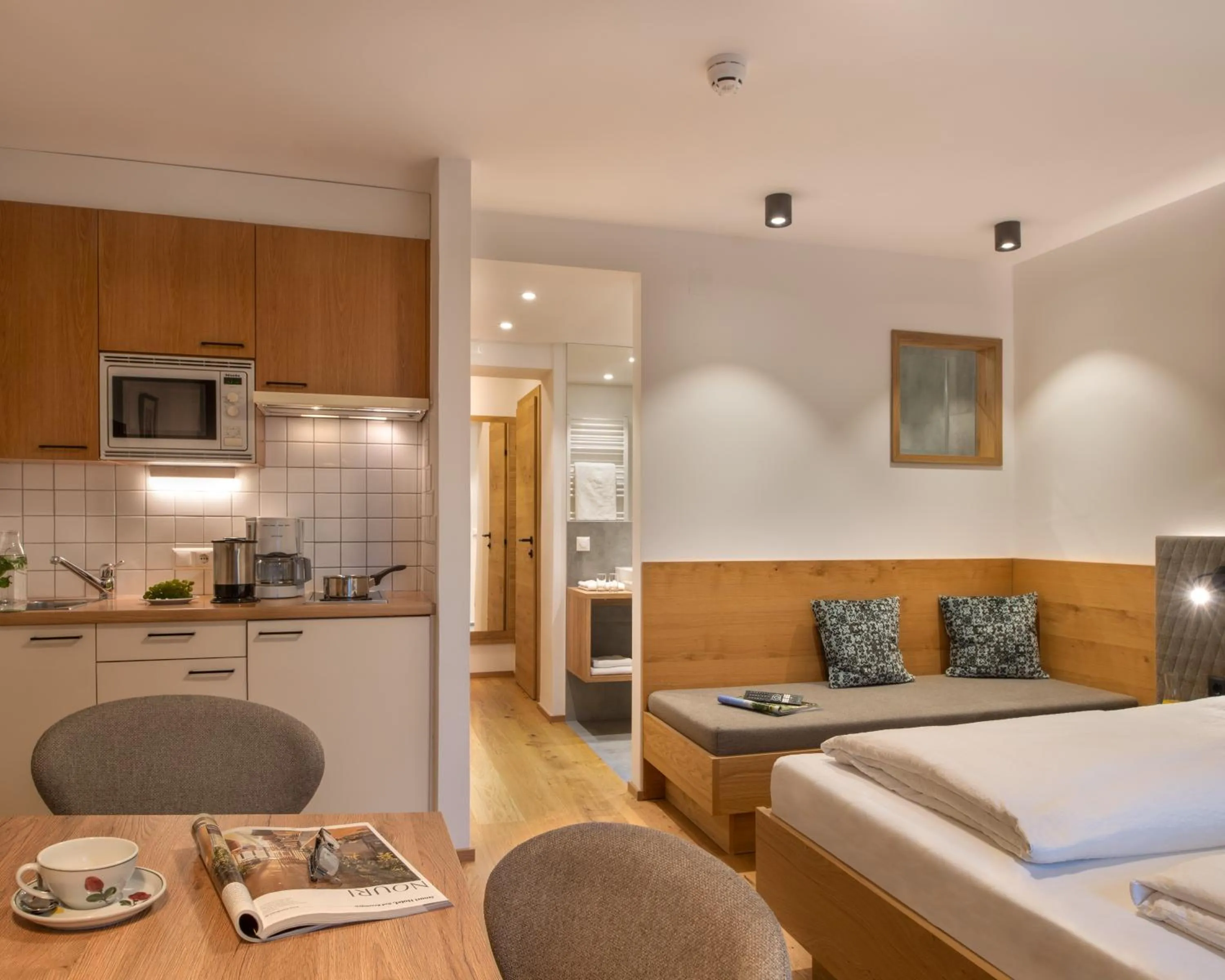 Kitchen or kitchenette, Bed in Ferienhof Neusacher Moser