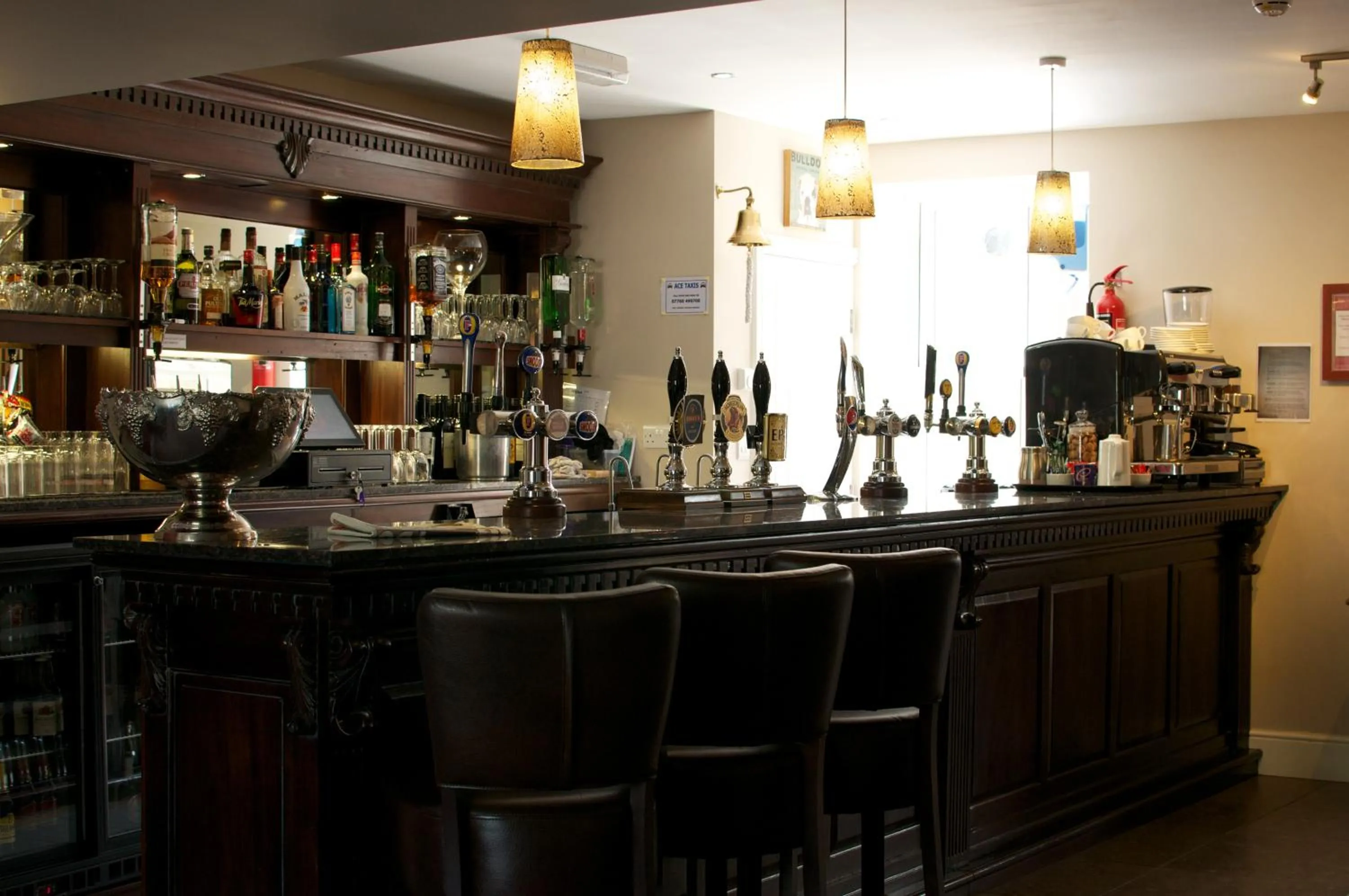 Lounge or bar in The Three Horseshoes Hotel