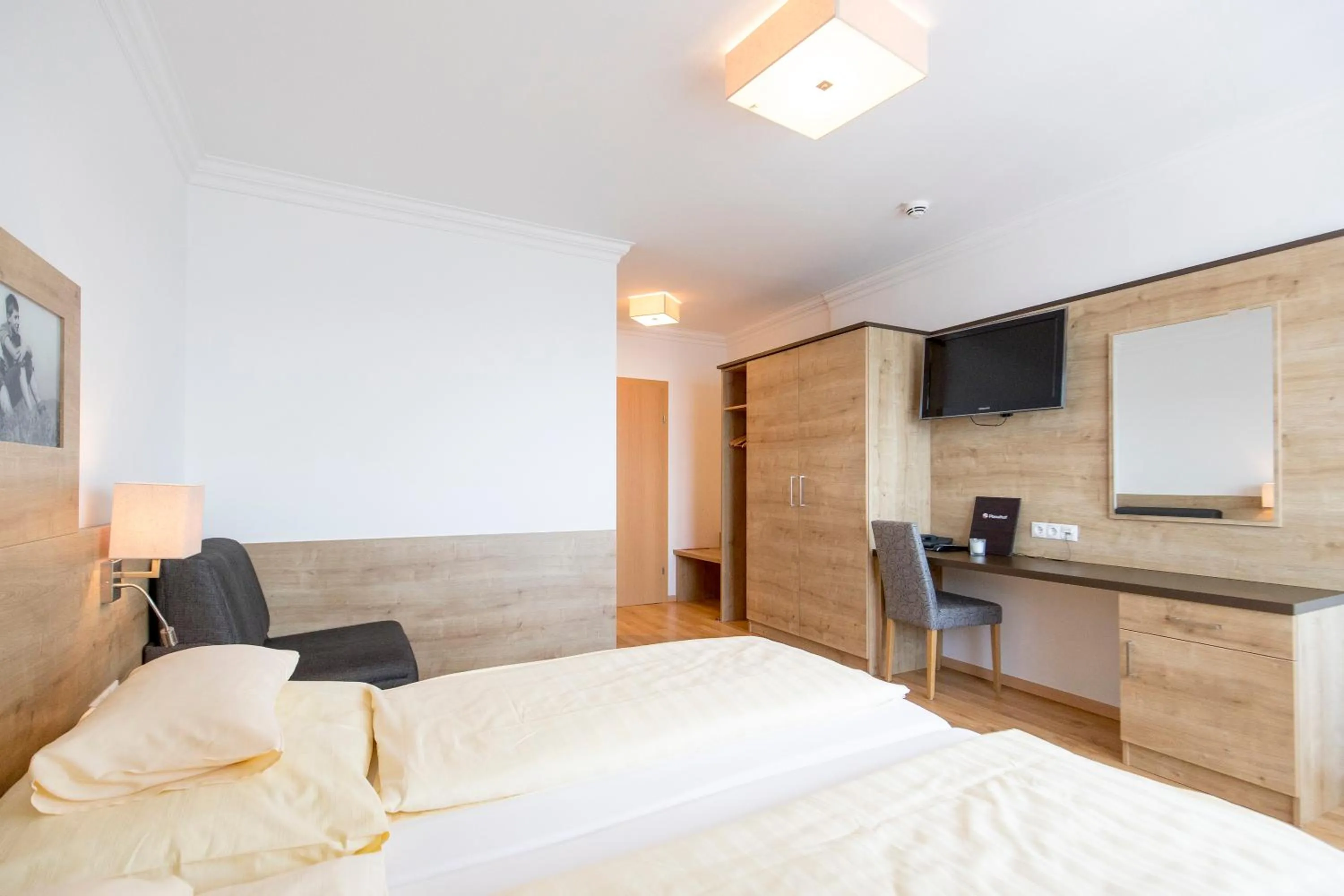 Photo of the whole room, Bed in Hotel-Restaurant Planaihof