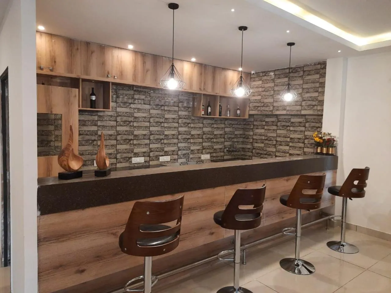 Seating area in Regenta INN Grand Koramangala by Royal Orchid Hotels