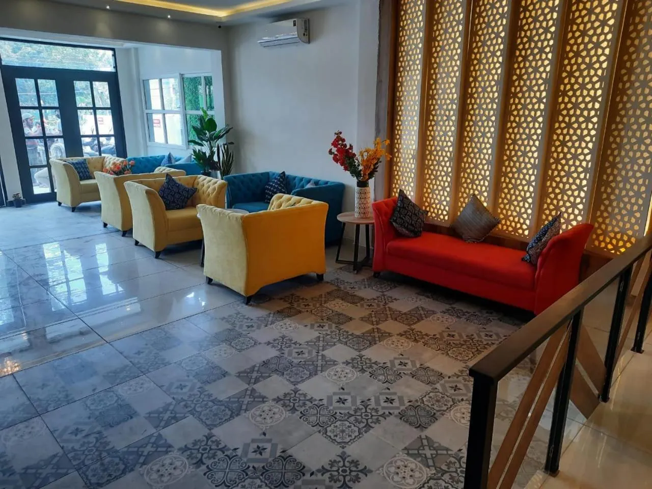 Seating area in Regenta INN Grand Koramangala by Royal Orchid Hotels